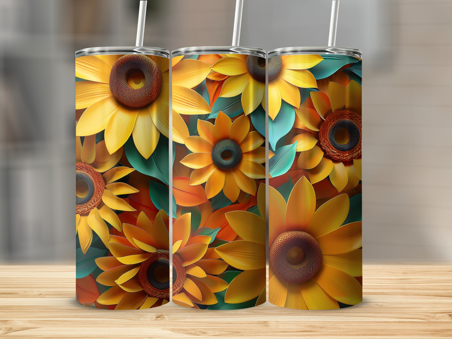 Three tall tumblers featuring a vibrant sunflower design.