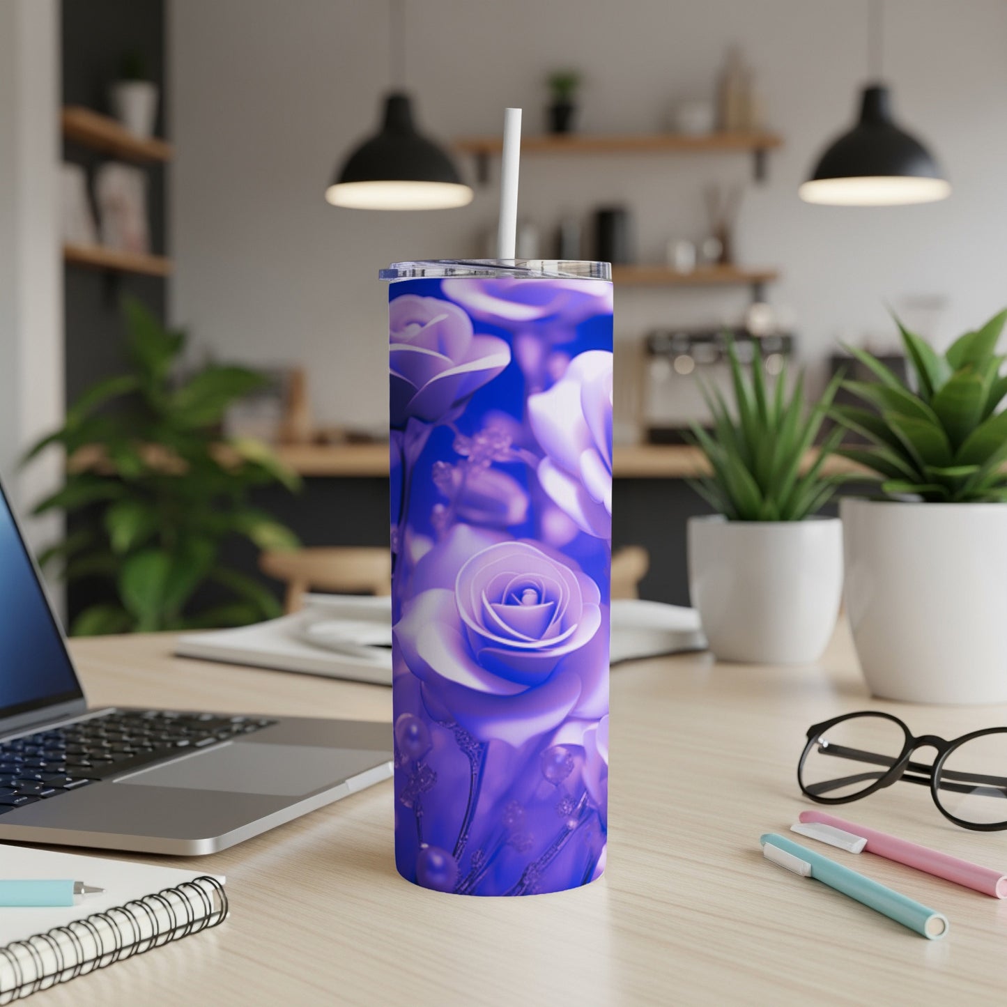 Purple rose floral pattern on a tall, slender tumbler with a straw.