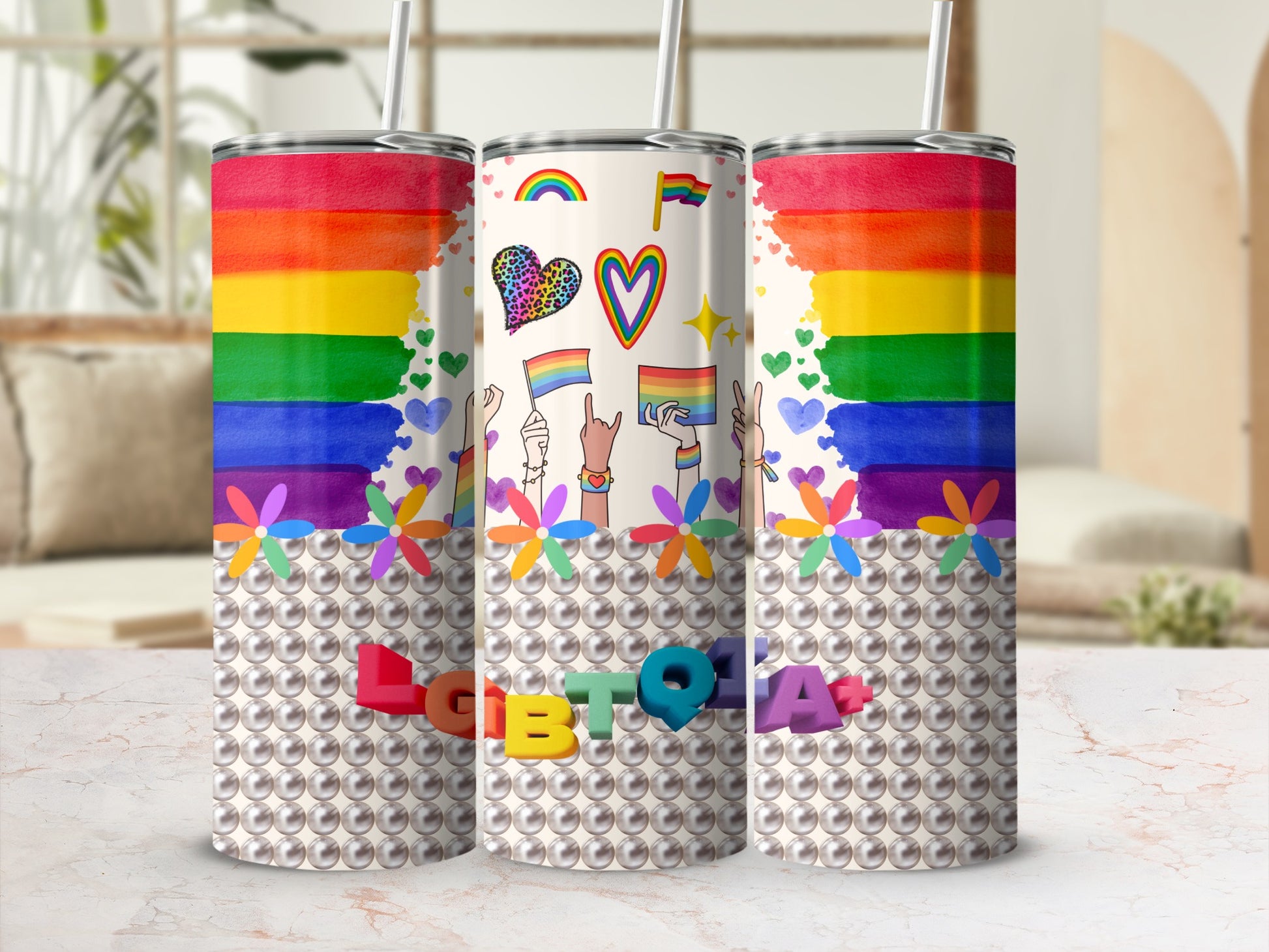 Rainbow flag tumbler with LGBTQIA+ symbols and "LGBTQ" text.