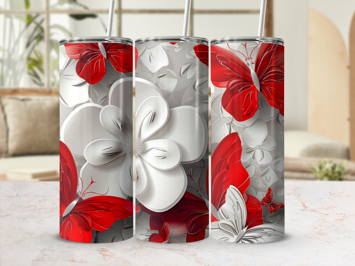 Three tumblers featuring red butterflies and white floral patterns.