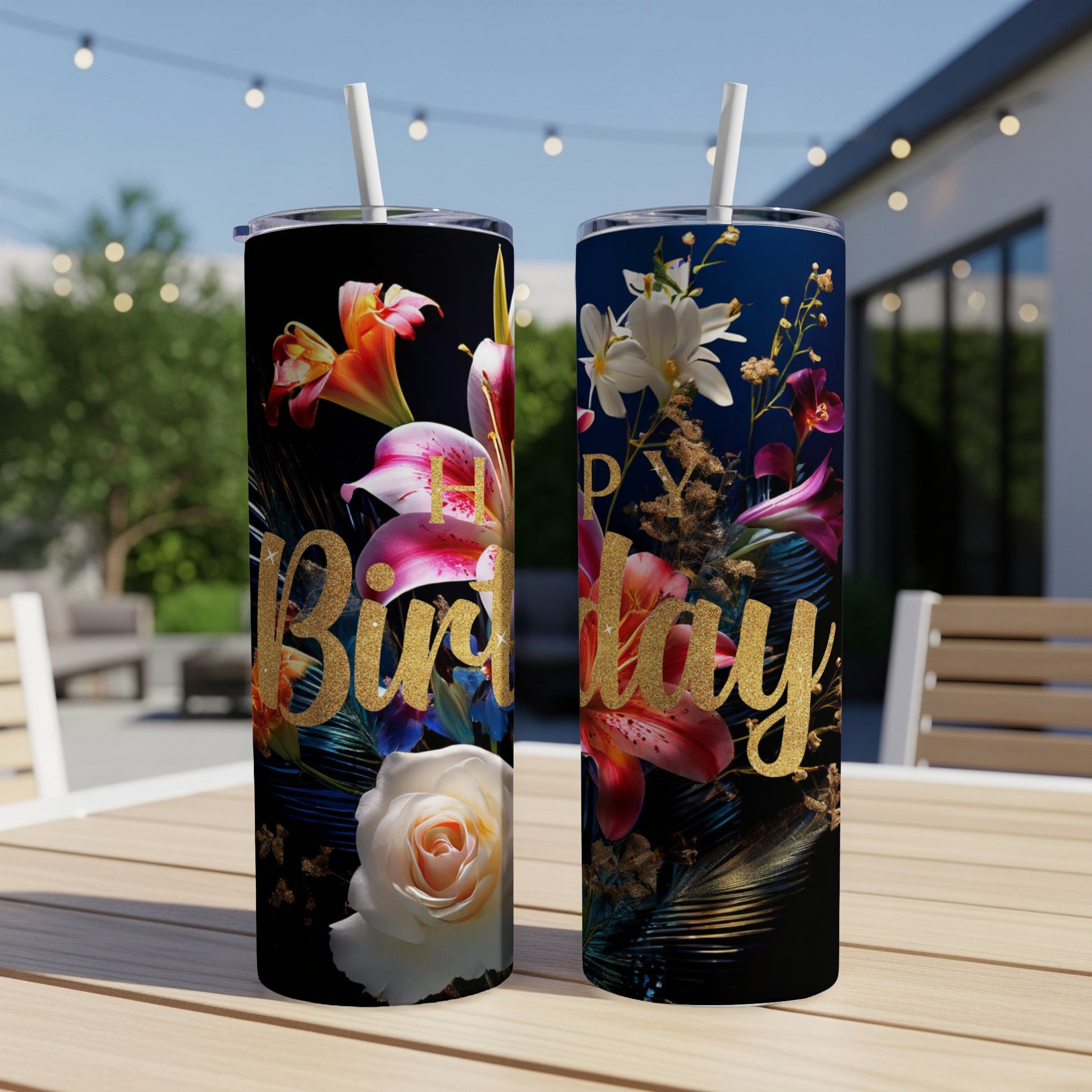 Two tall tumblers with a gold "Happy Birthday" text and floral design.