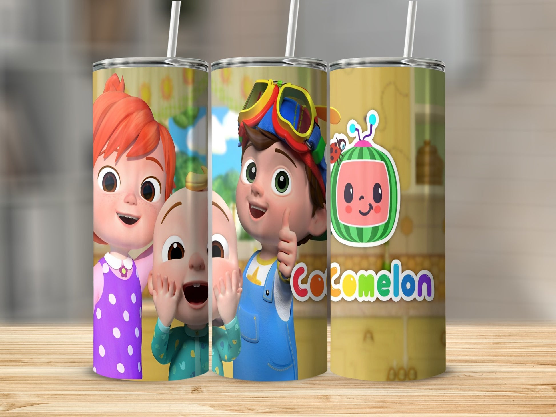 Cocomelon characters JJ and TomTom on a yellow tumbler with Cocomelon logo.