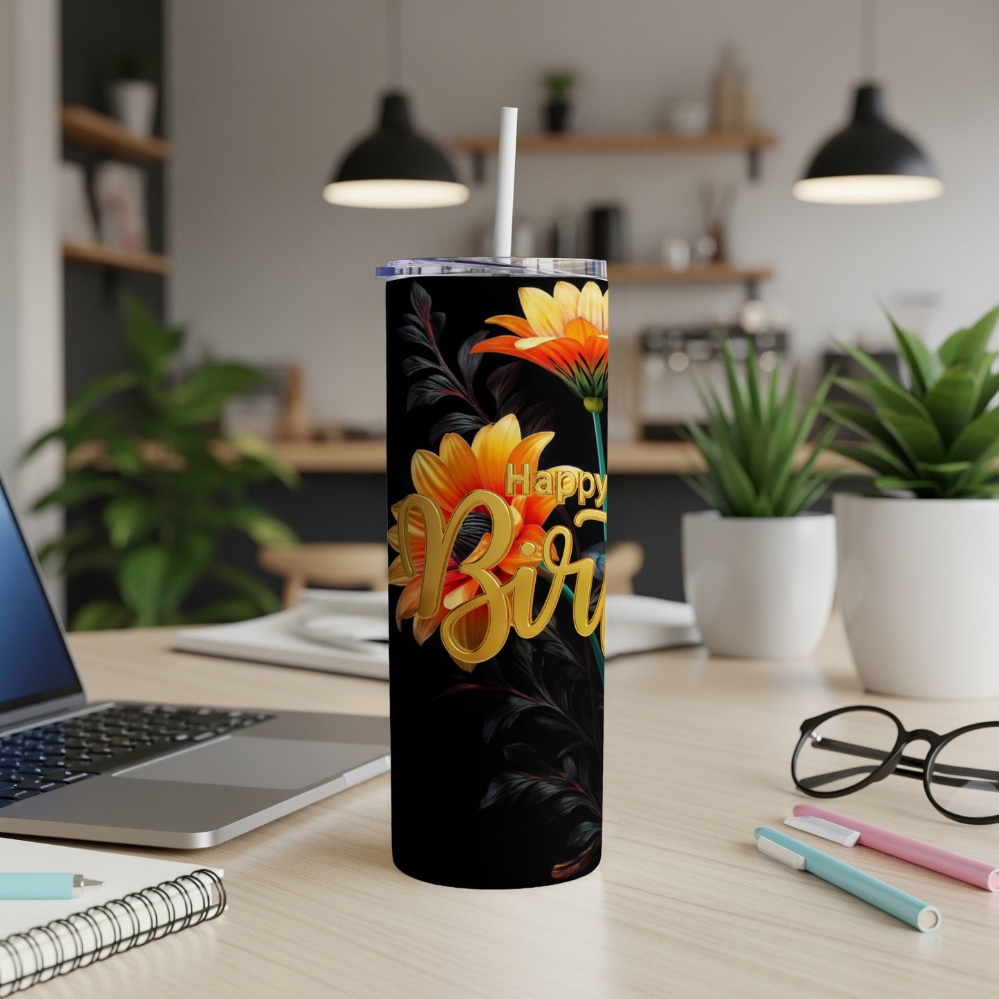 Black tumbler with "Happy Birthday" text and floral design.
