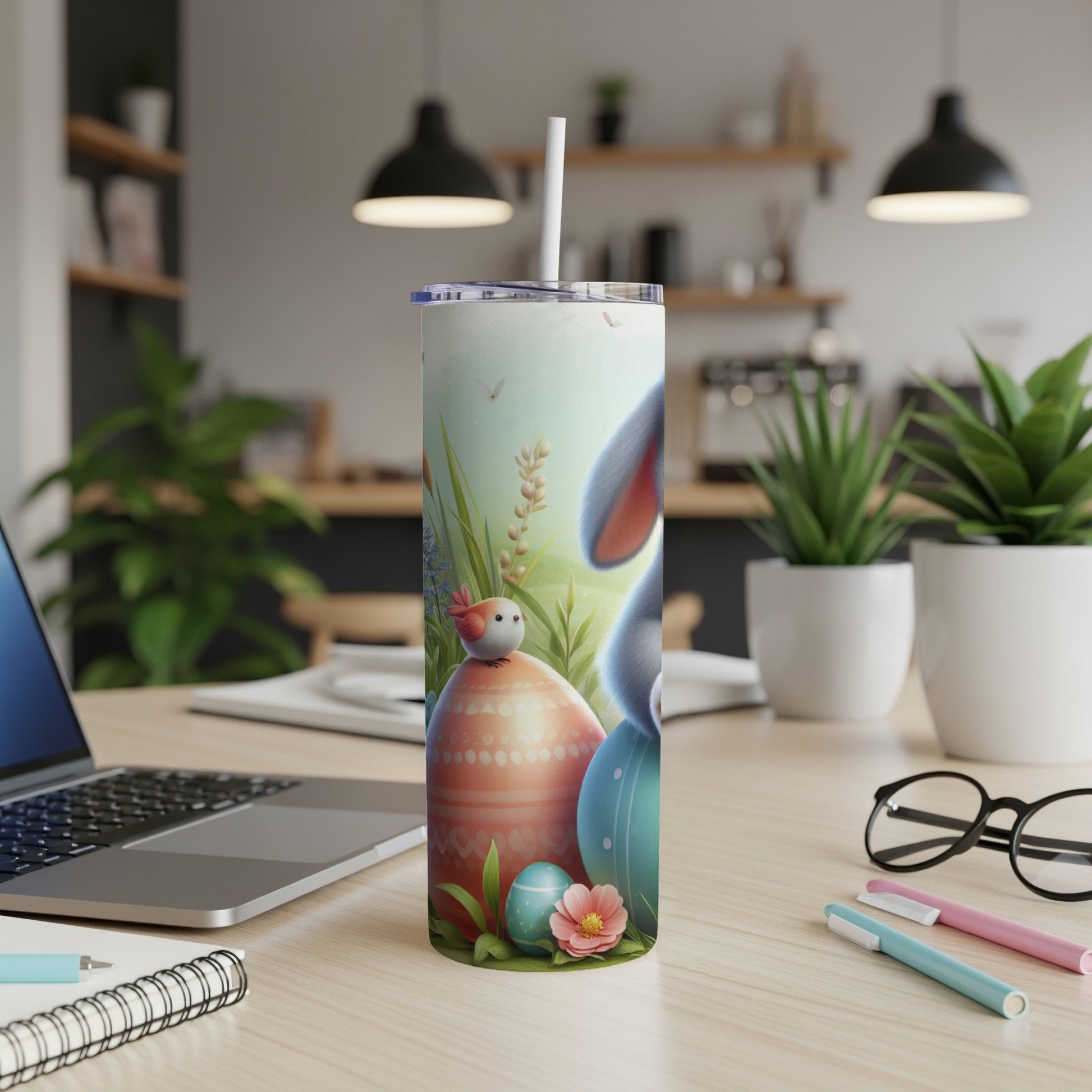 Easter bunny and eggs on a decorated tumbler with a straw.