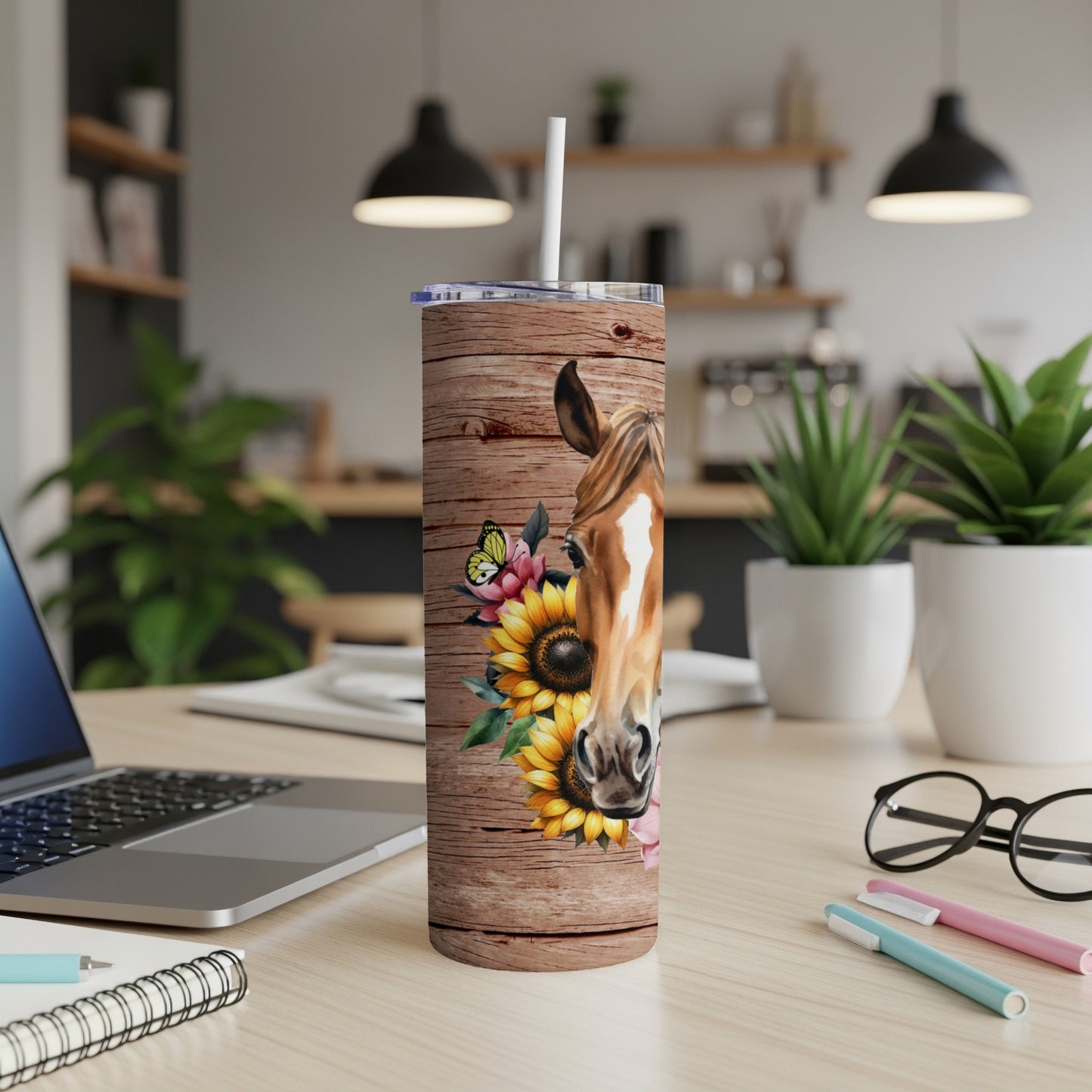 Horse and sunflowers on wood grain tumbler with straw.