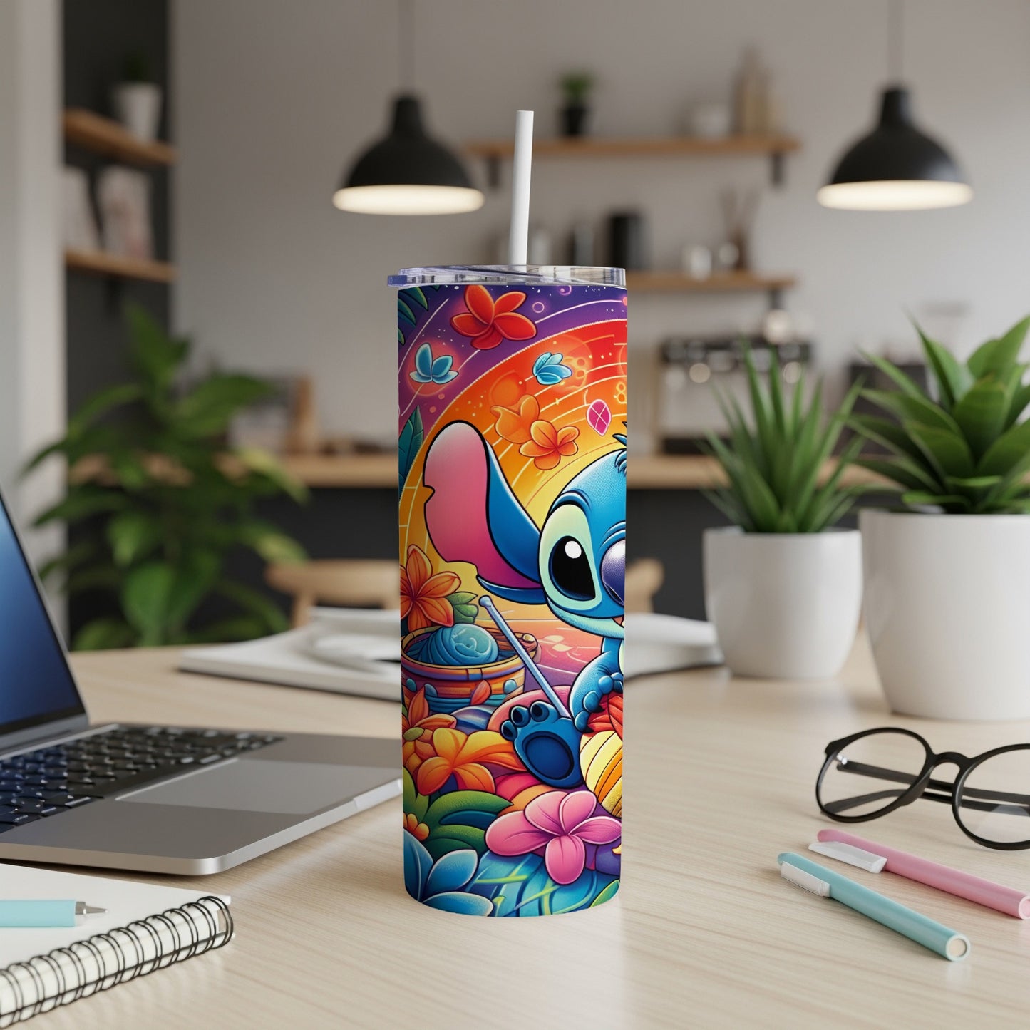 Stitch character on a colorful tumbler with yarn and flowers.