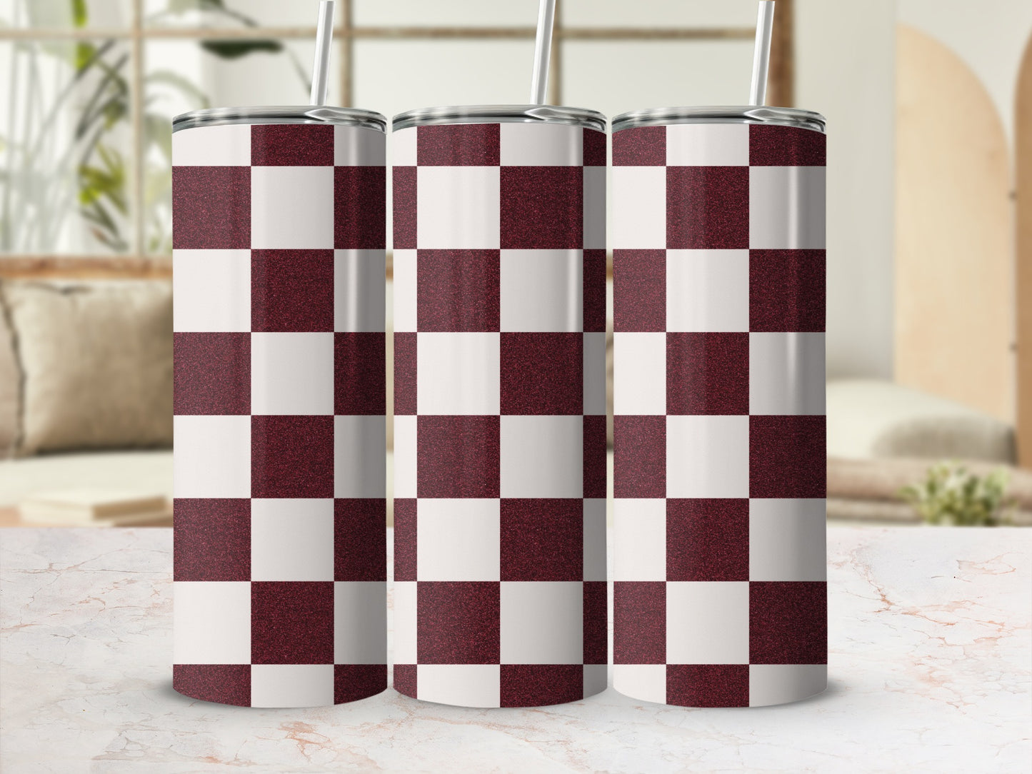 Three tumblers with a maroon and white checkerboard pattern.
