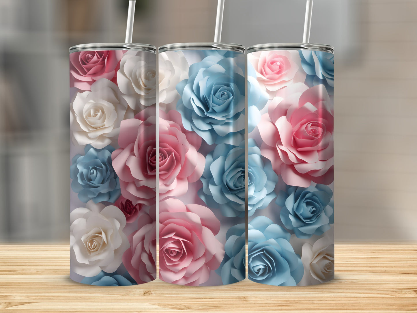 Three tumblers with pink and blue paper rose floral pattern.