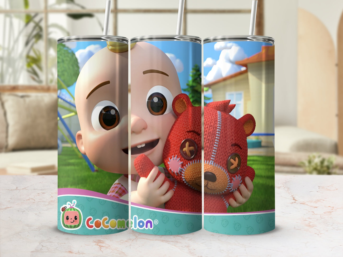 Cocomelon tumbler with a cartoon child hugging a red teddy bear.