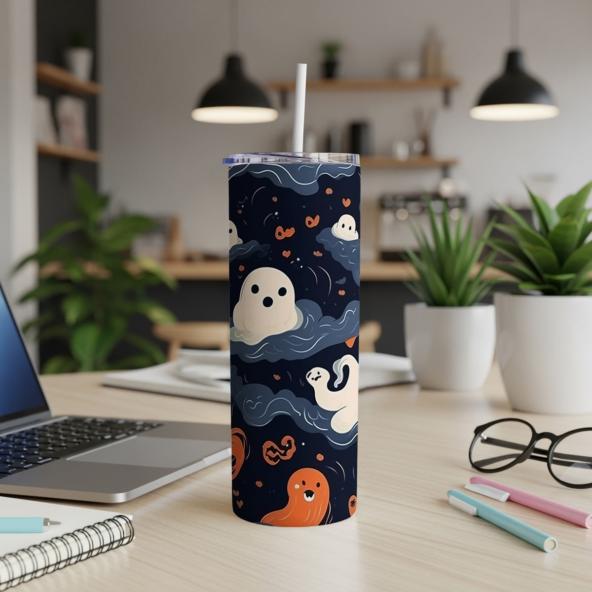 Tall tumbler with a dark blue background and a pattern of cute ghosts and hearts.