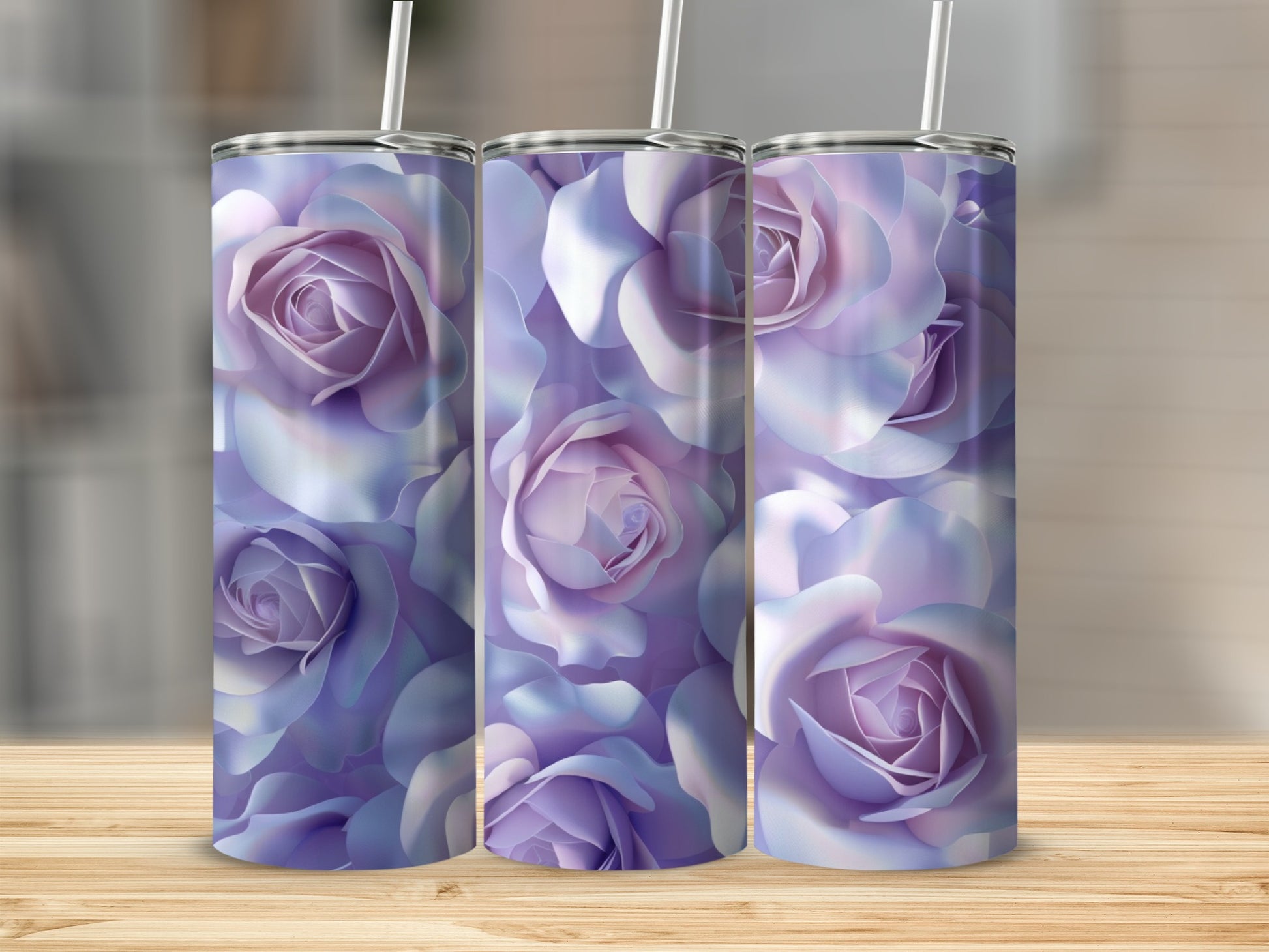 Three tumblers with a lavender rose floral pattern displayed on a wooden surface.