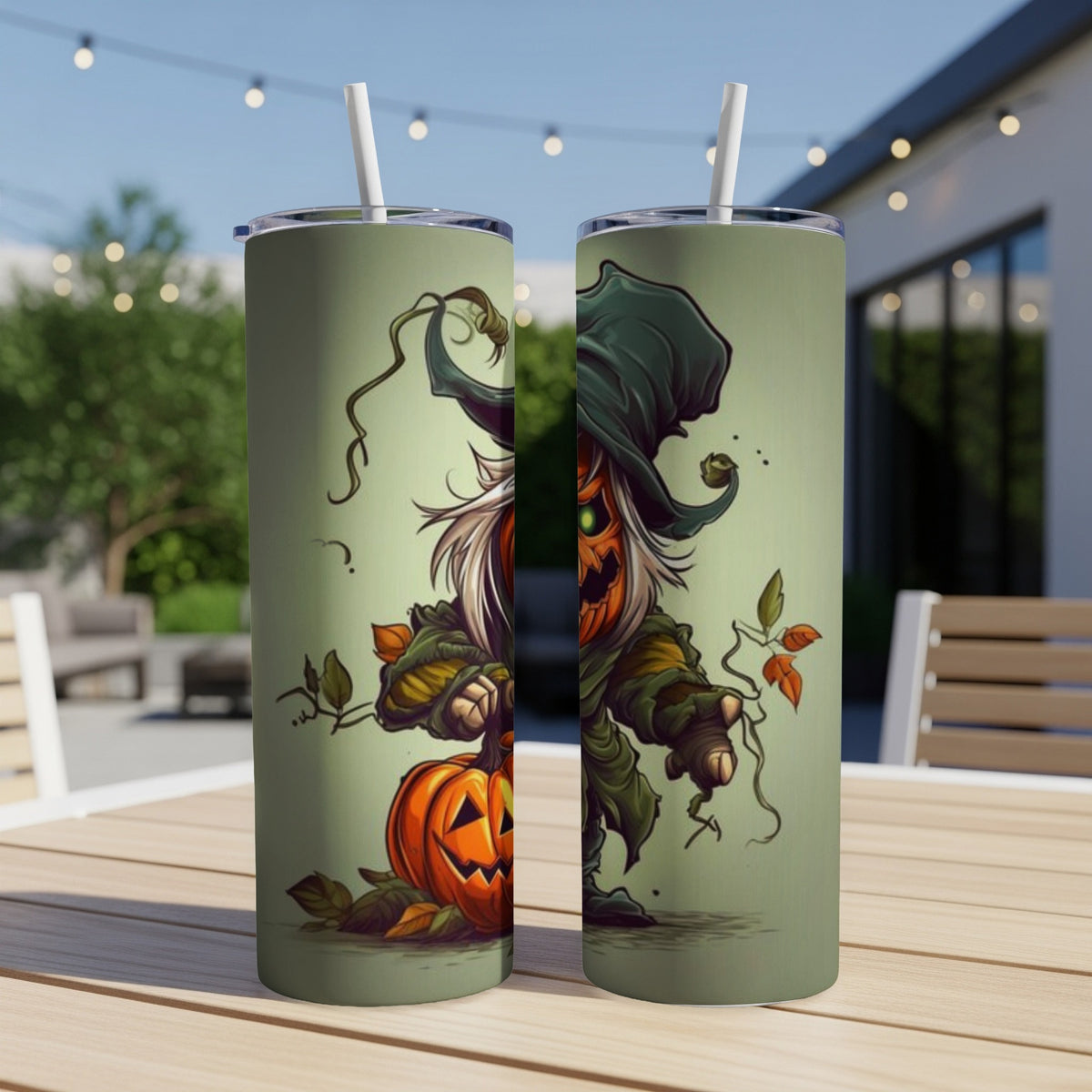 Two tumblers with a spooky jack-o'-lantern scarecrow design.