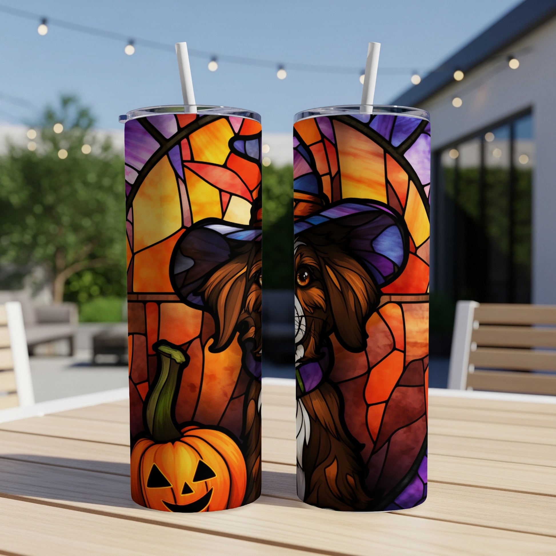 Two tumblers with stained-glass dog and jack-o'-lantern Halloween design.