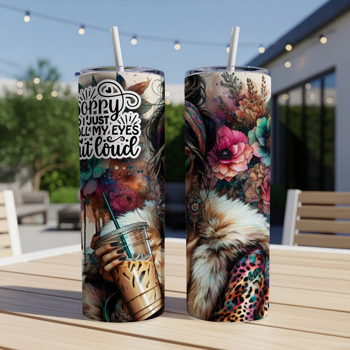 "Sorry I just roll my eyes out loud" text on a floral and leopard print tumbler.