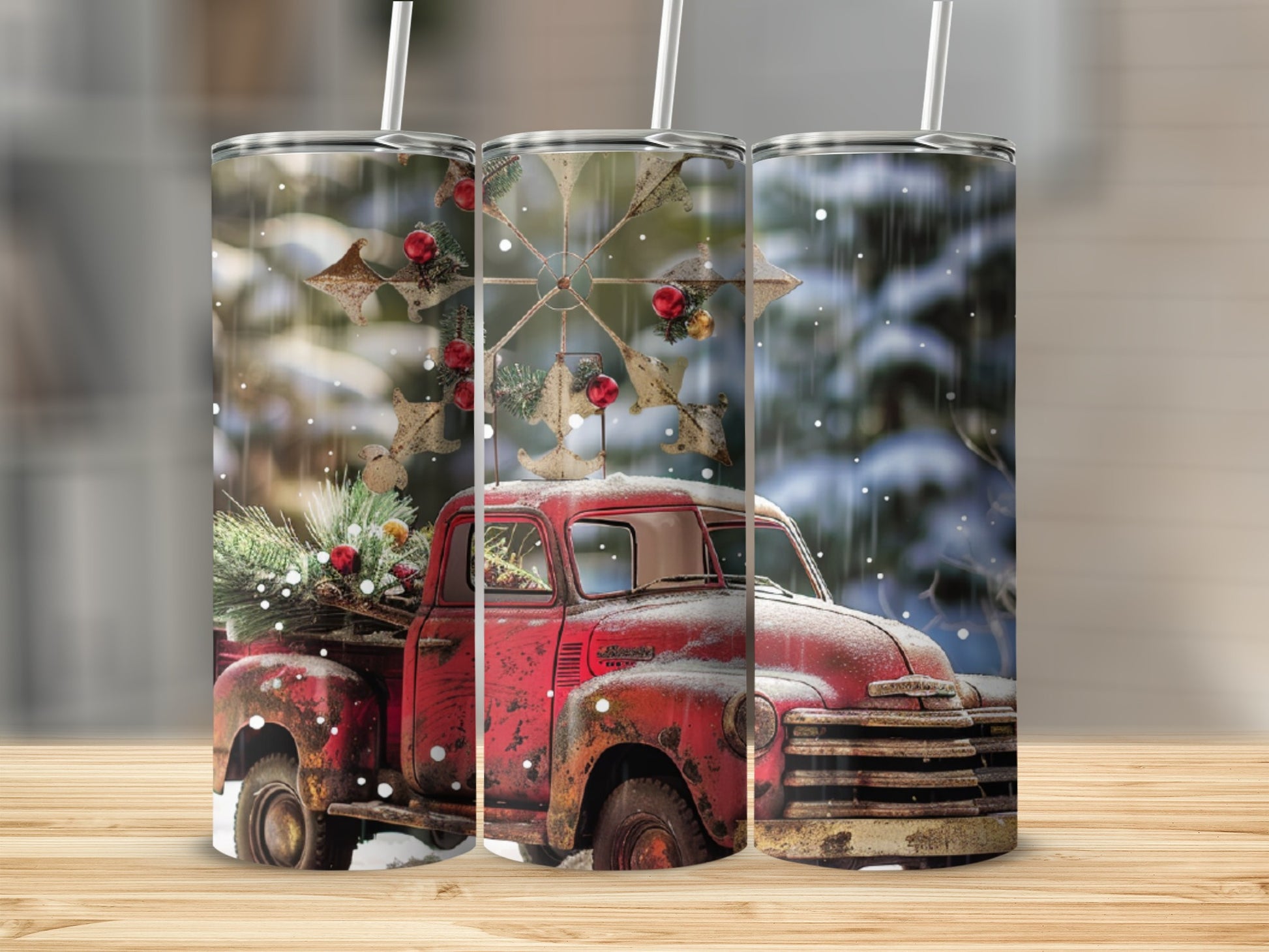 Rustic red pickup truck with Christmas tree and snowfall design on tumblers.