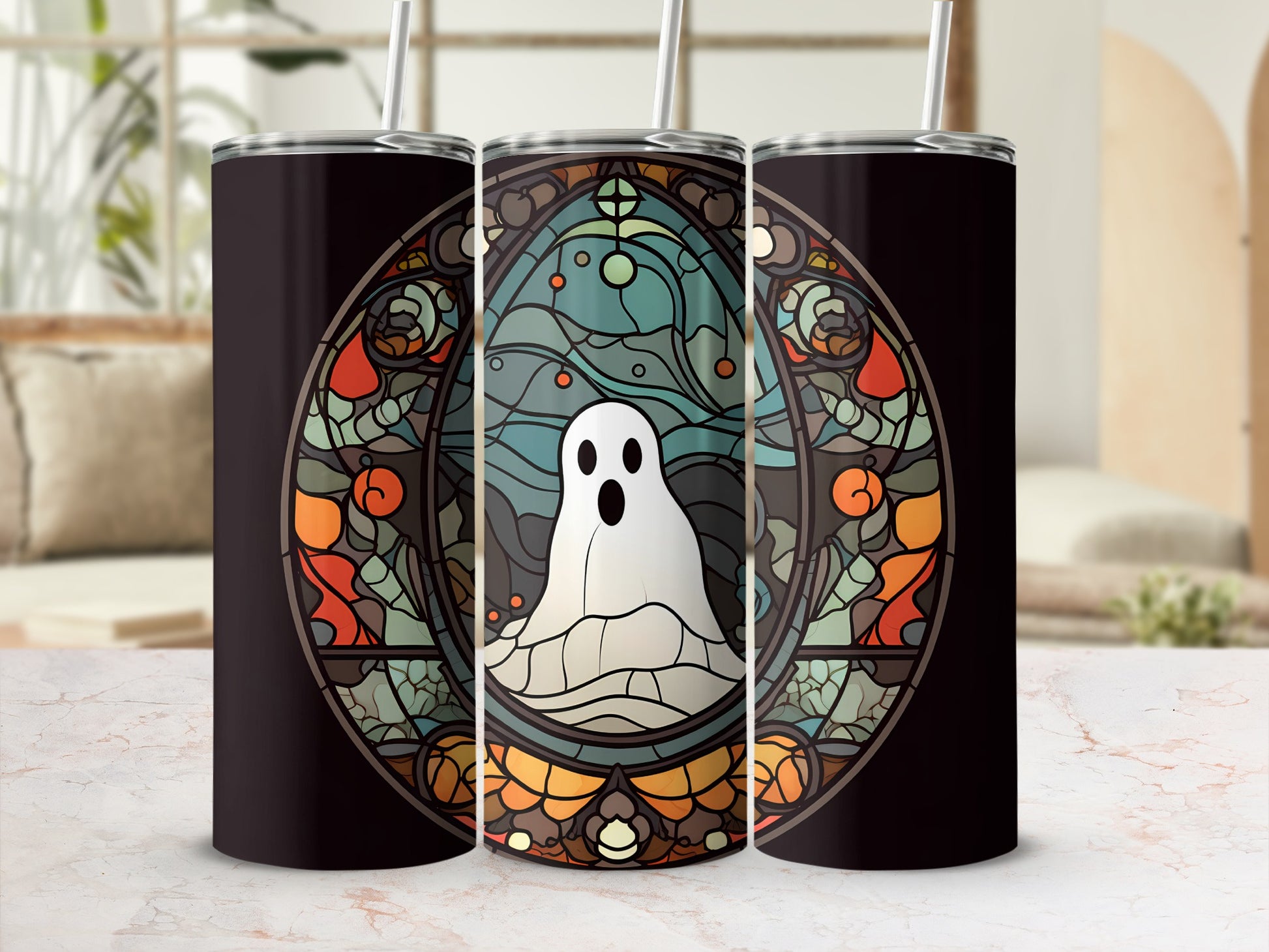 Ghost stained glass pattern on a black tumbler with straws.