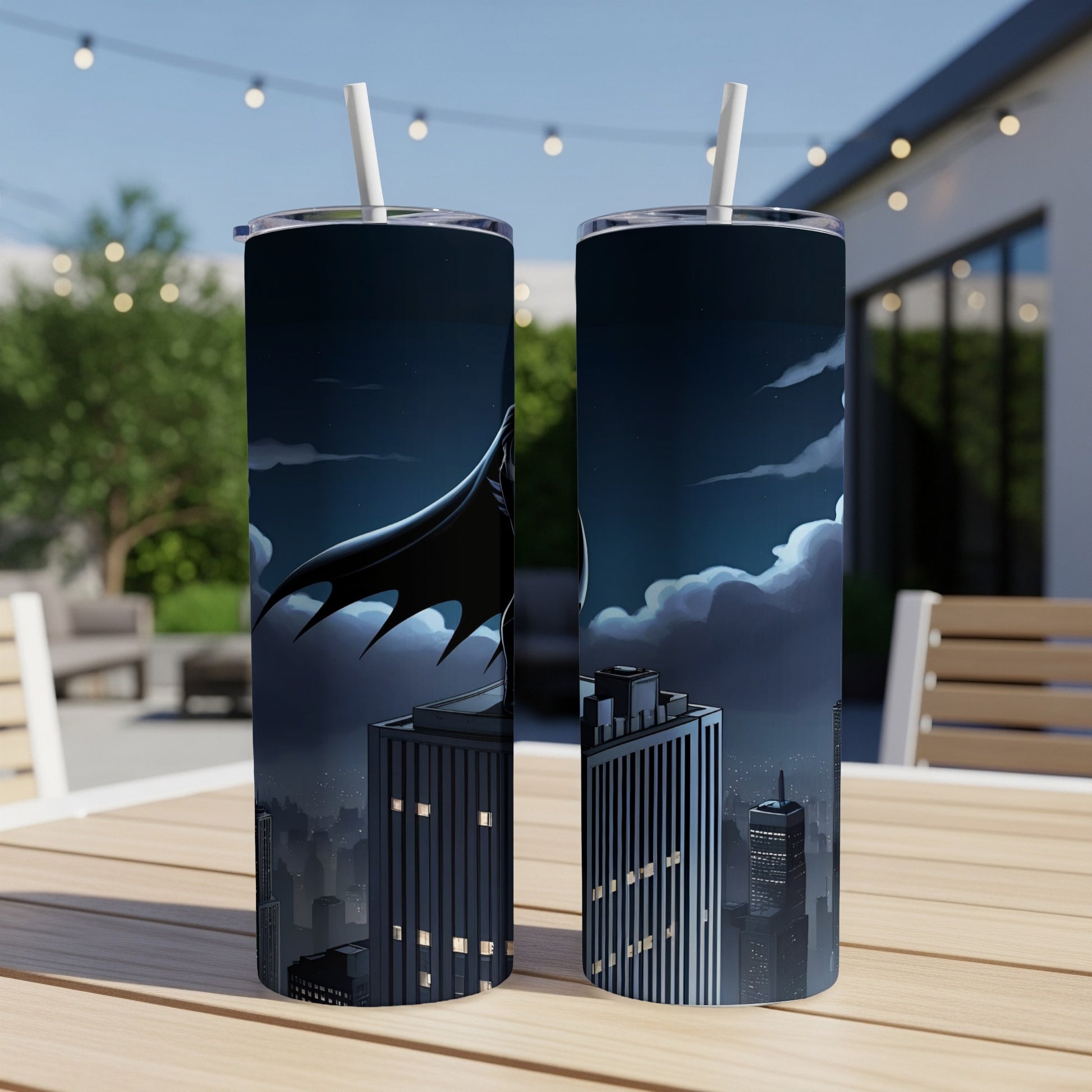Batman silhouette against city skyline on double tumblers.