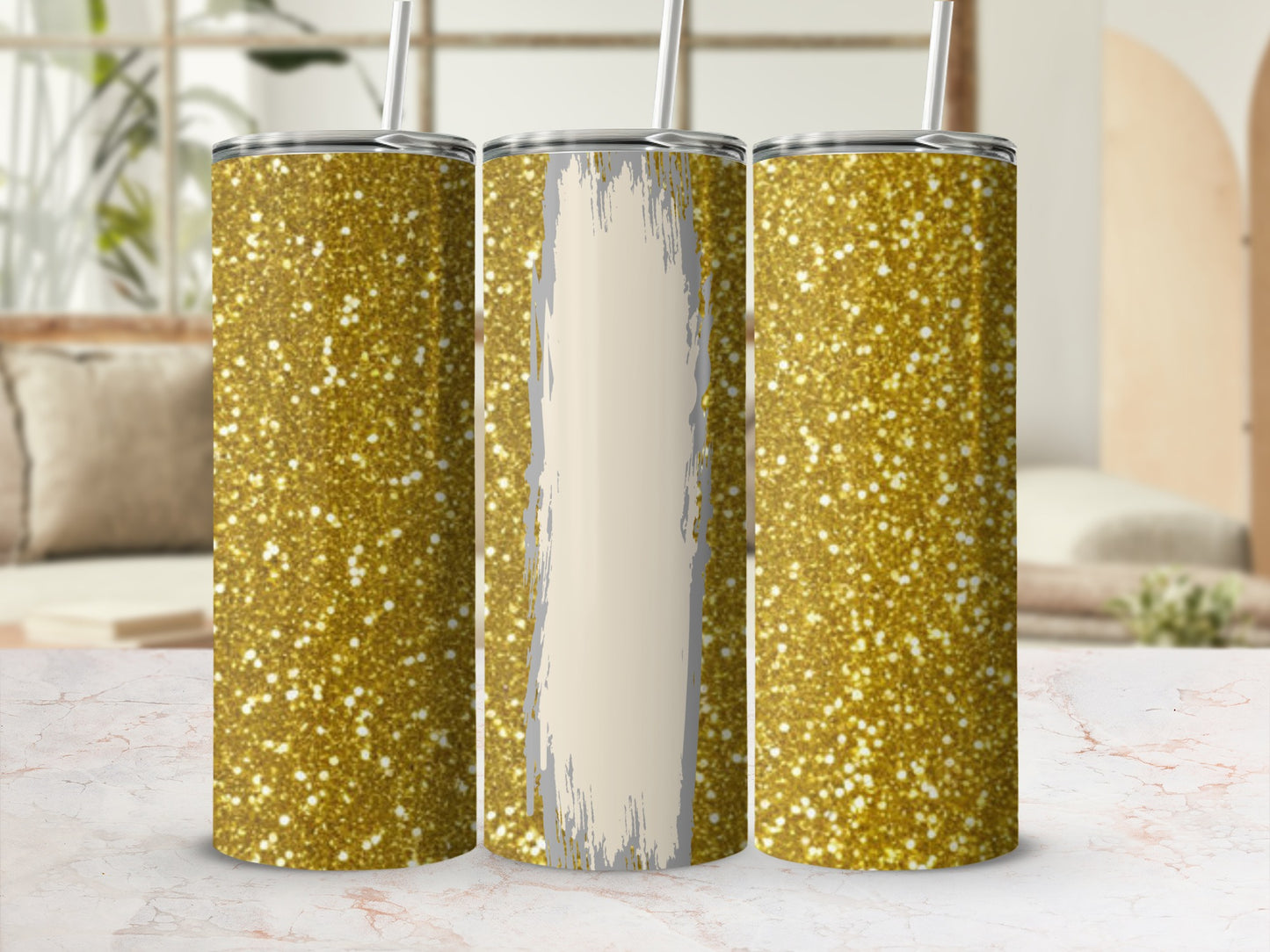 Three glitter tumblers with straw, one with a distressed cream panel.