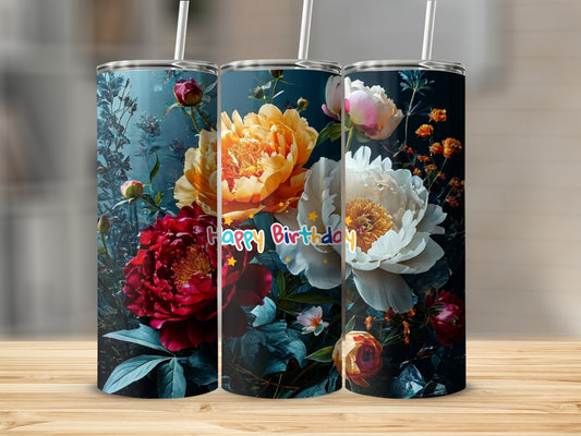 Three tumblers featuring colorful floral designs and "Happy Birthday" text.