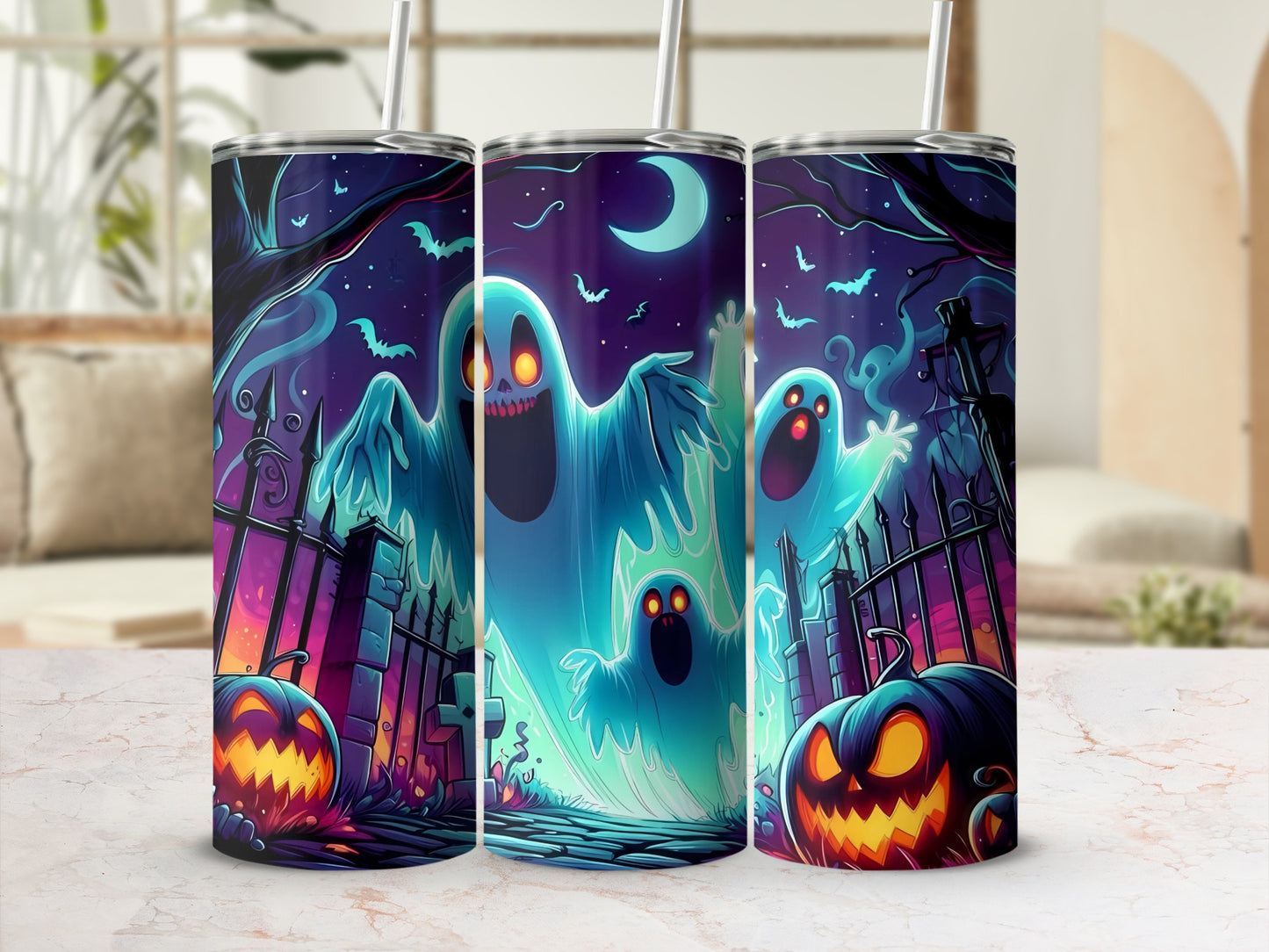 Three tumblers with a Halloween scene featuring ghosts, pumpkins, and a graveyard.