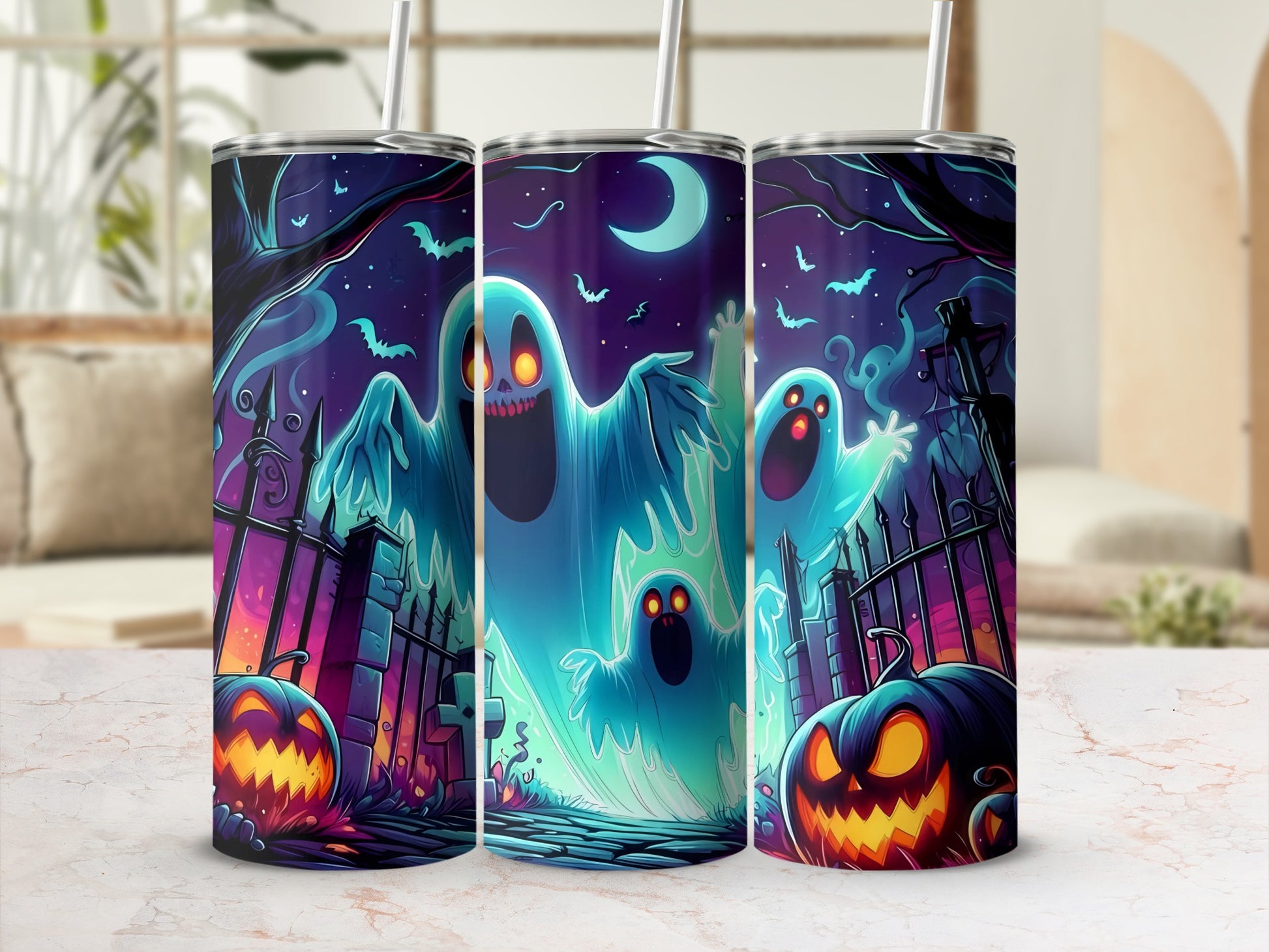Three tumblers with a Halloween scene featuring ghosts, pumpkins, and a graveyard.