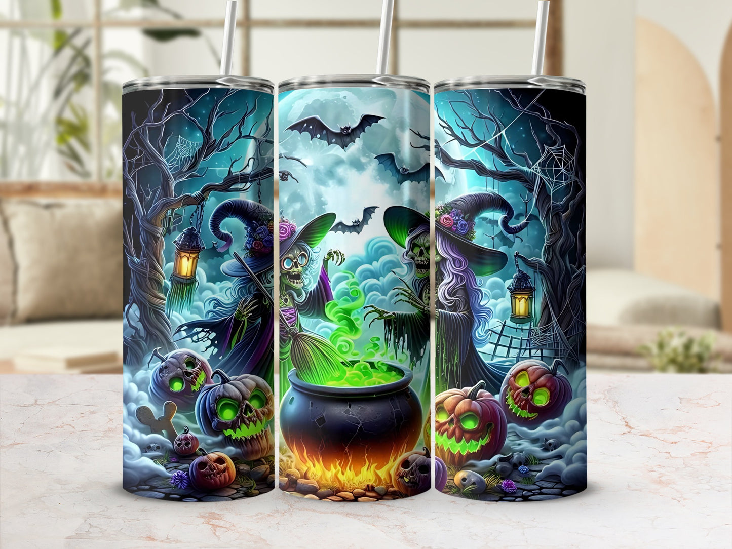 Three tumblers with Halloween witches, cauldrons, pumpkins, and bats.