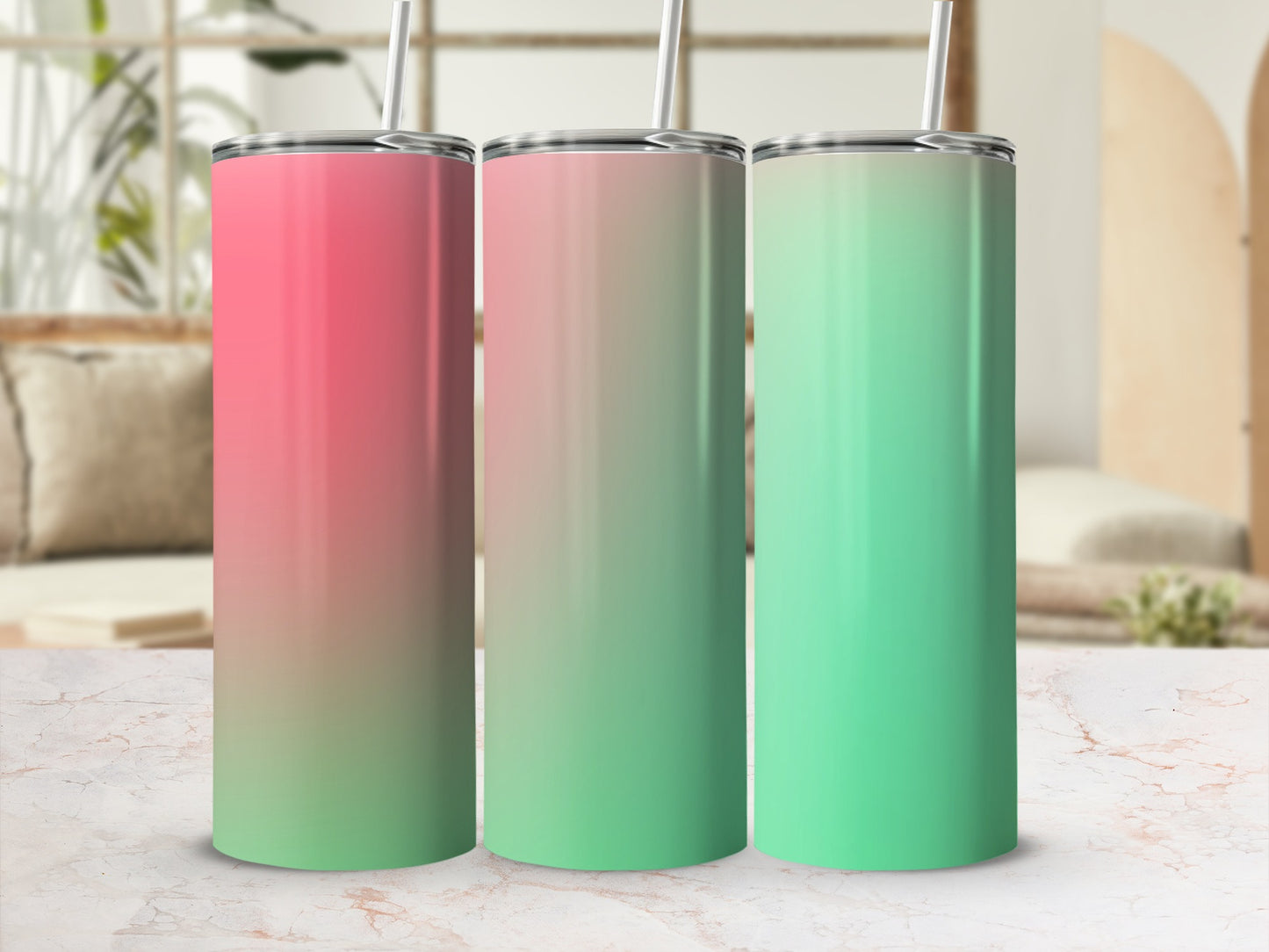 Three tumblers with gradient colors of pink, green, and pink to green.