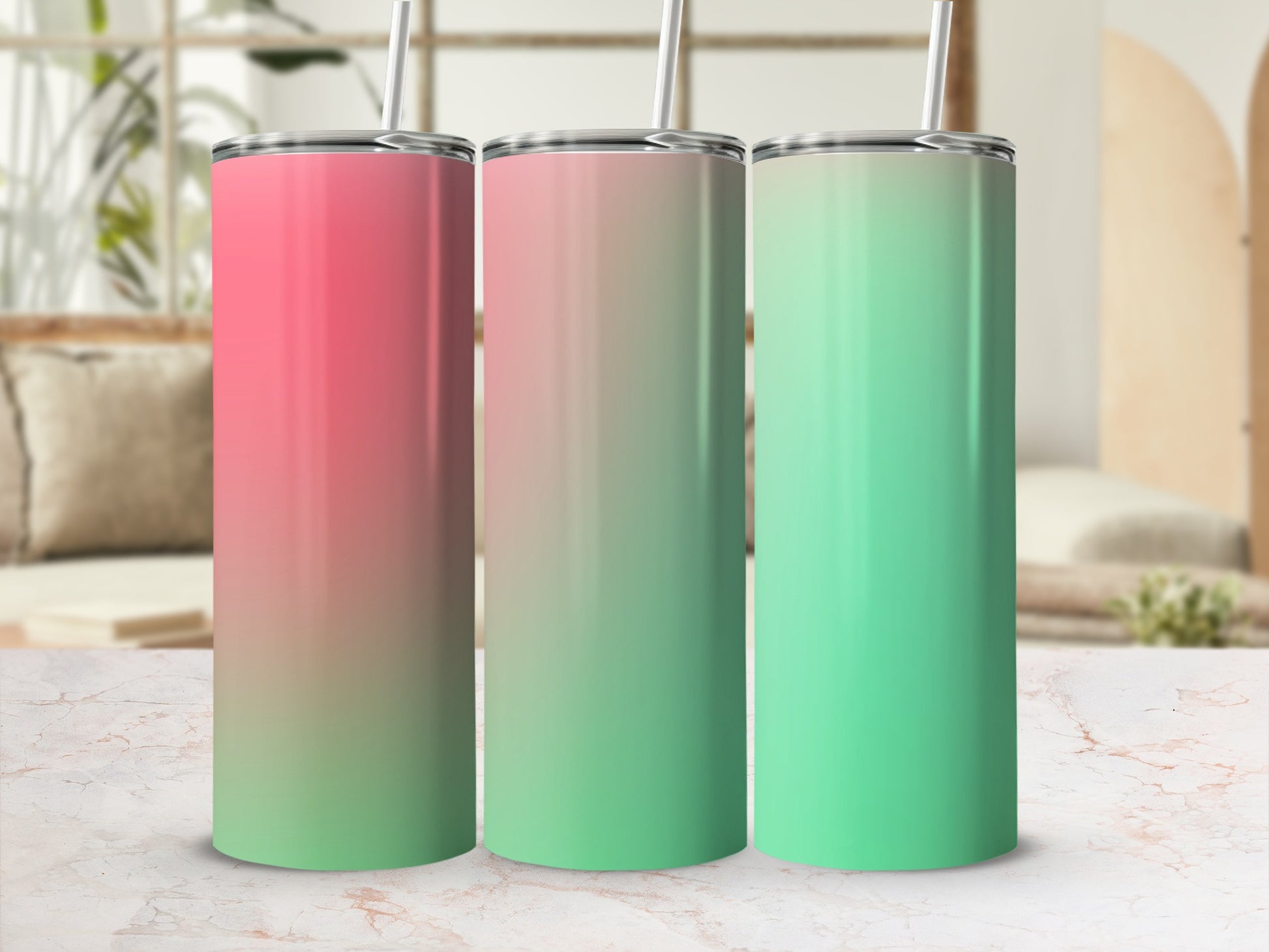 Three tumblers with gradient colors of pink, green, and pink to green.