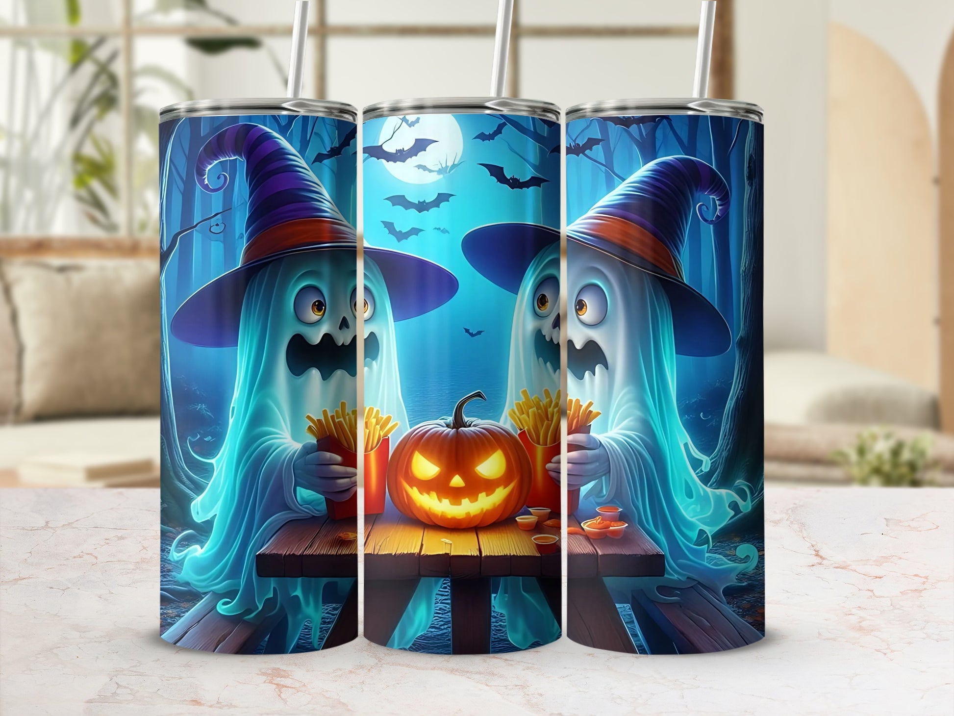 Three tumblers featuring ghosts in witch hats, a jack-o'-lantern, and french fries.