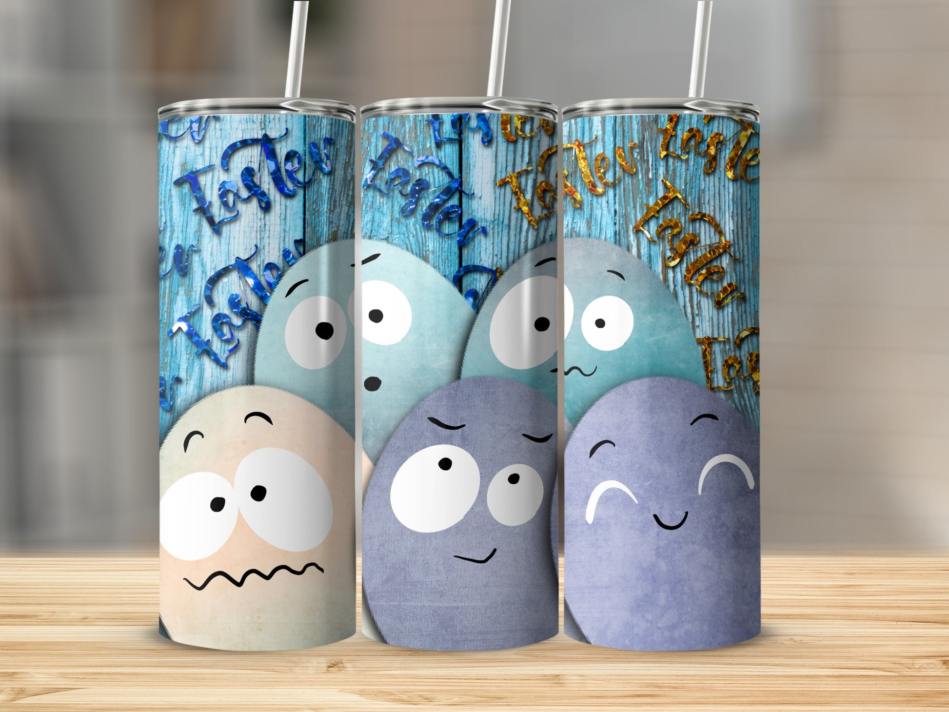 Three tumblers with cartoon faces and "Easter" text on blue wood background.