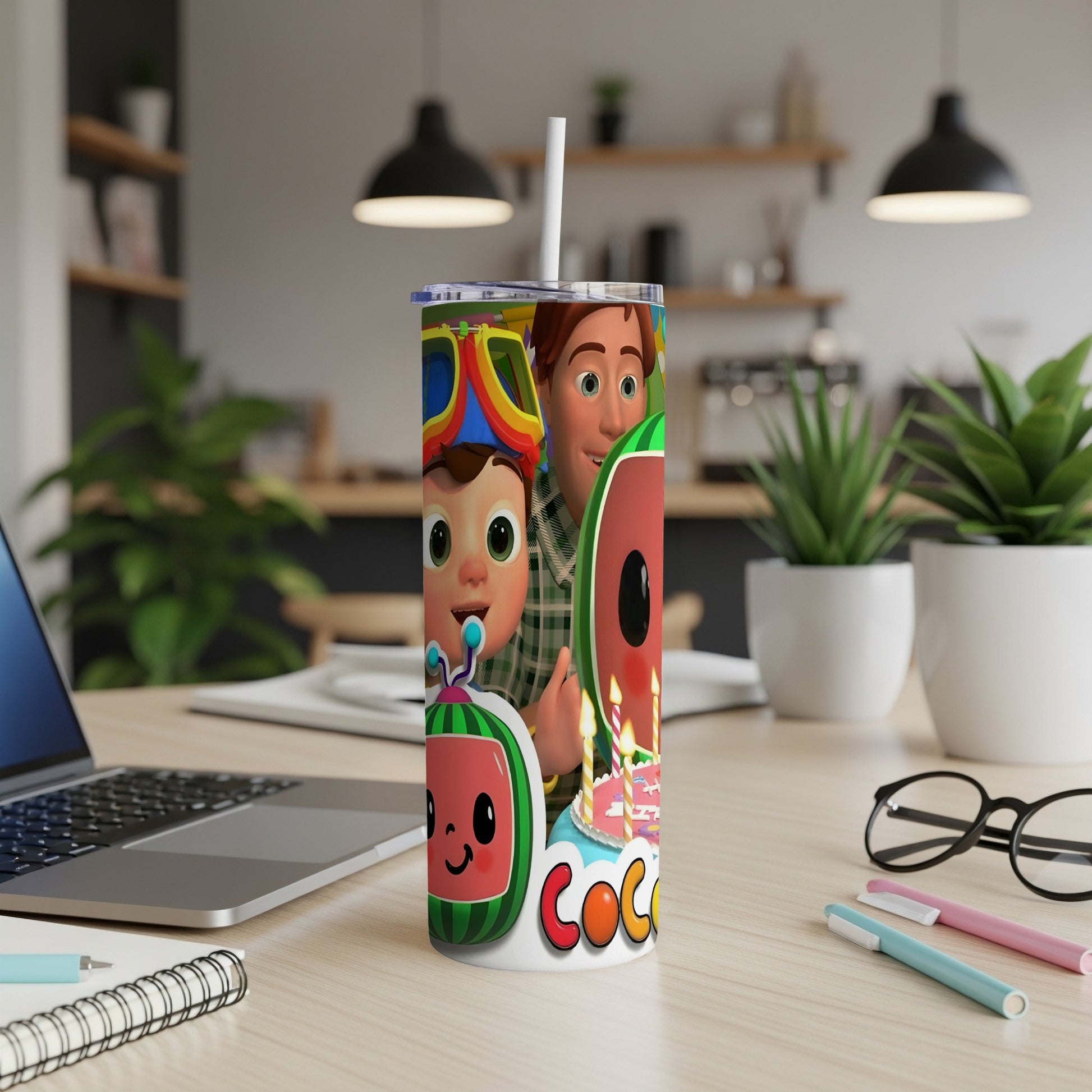 Cocomelon character tumbler with watermelon and birthday candles.