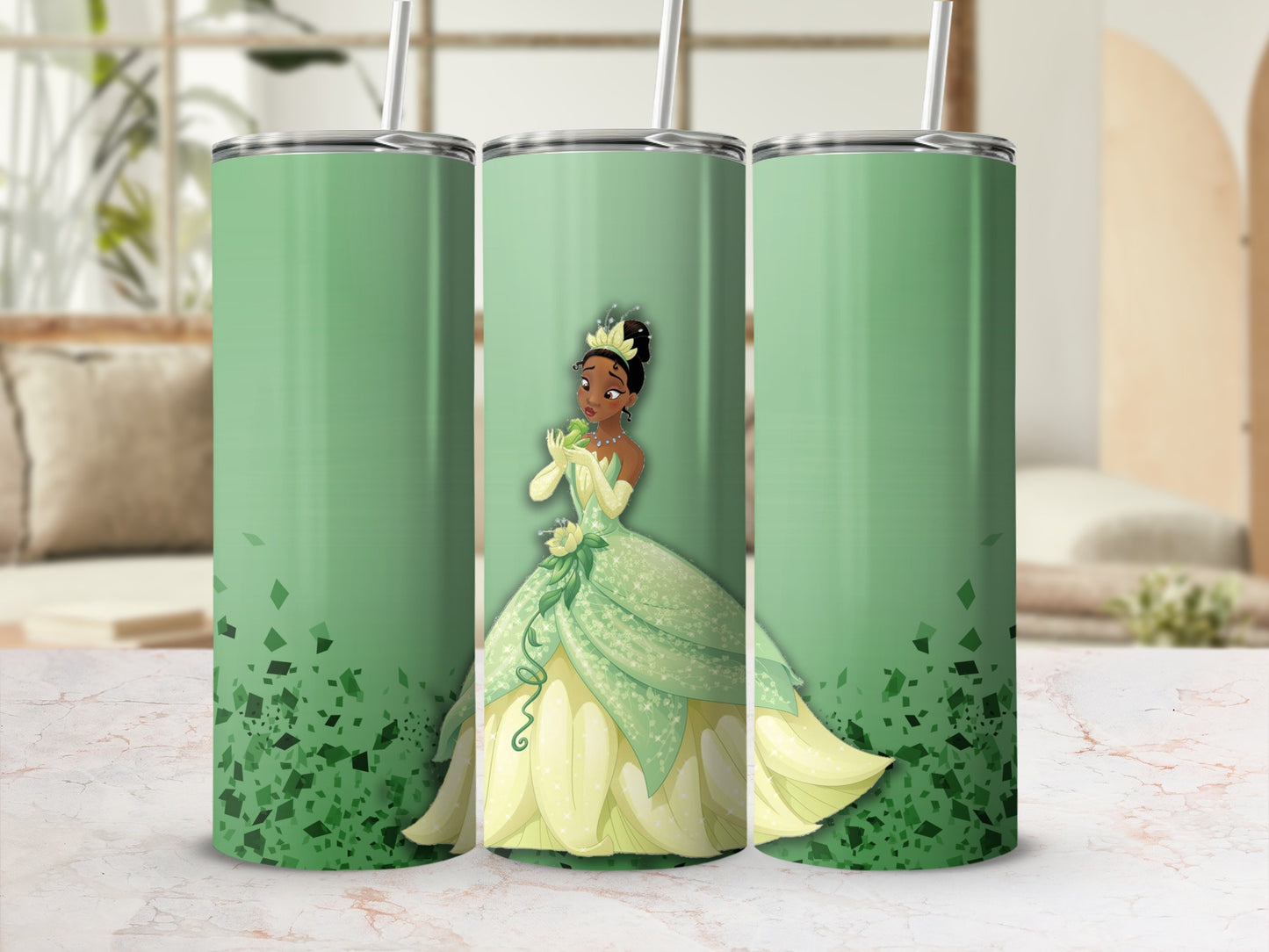Green tumbler with Princess Tiana in a yellow and green ballgown.