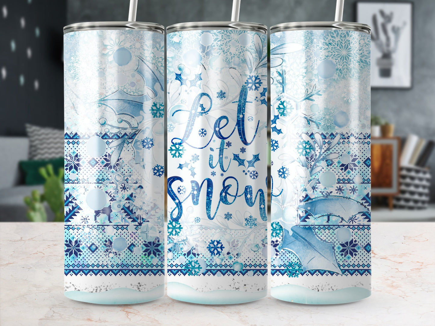Blue and white snowflake pattern tumbler with "Let it snow" text.