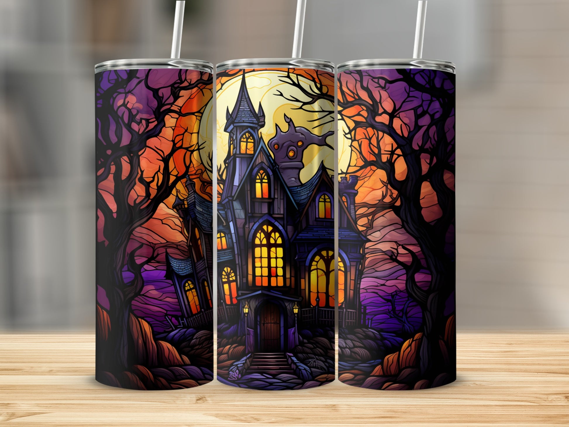 Halloween castle and bare trees with full moon, on three tumblers.