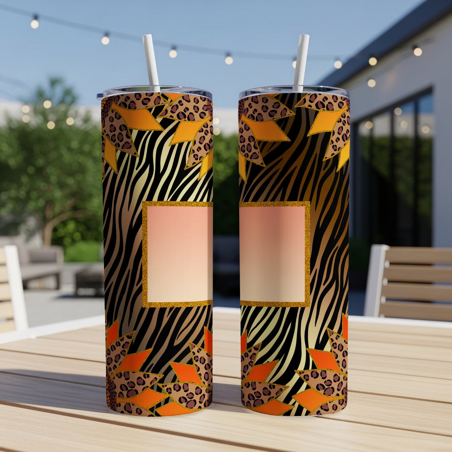 Two tall tumblers with tiger stripe and leopard print pattern.