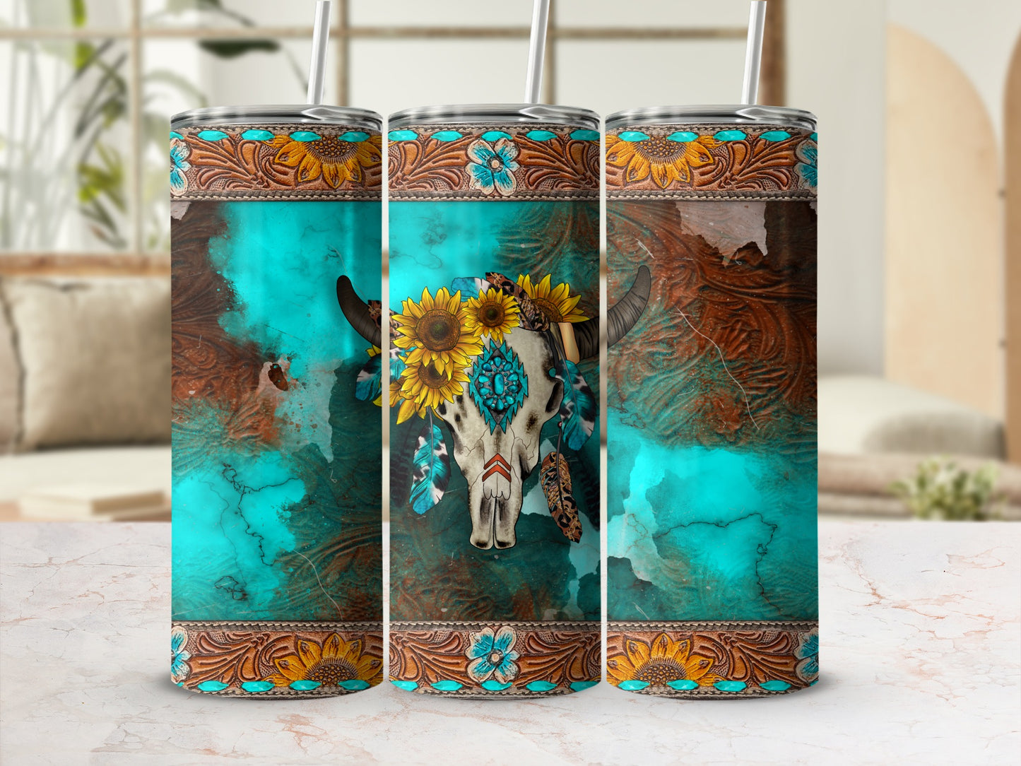 Western-style tumbler with bull skull, sunflowers, and feathers on turquoise background.