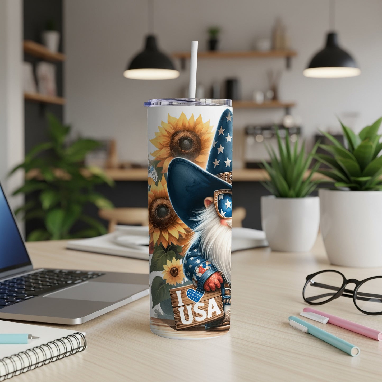 Gnome wearing USA hat with sunflowers and "I USA" sign on tumbler.