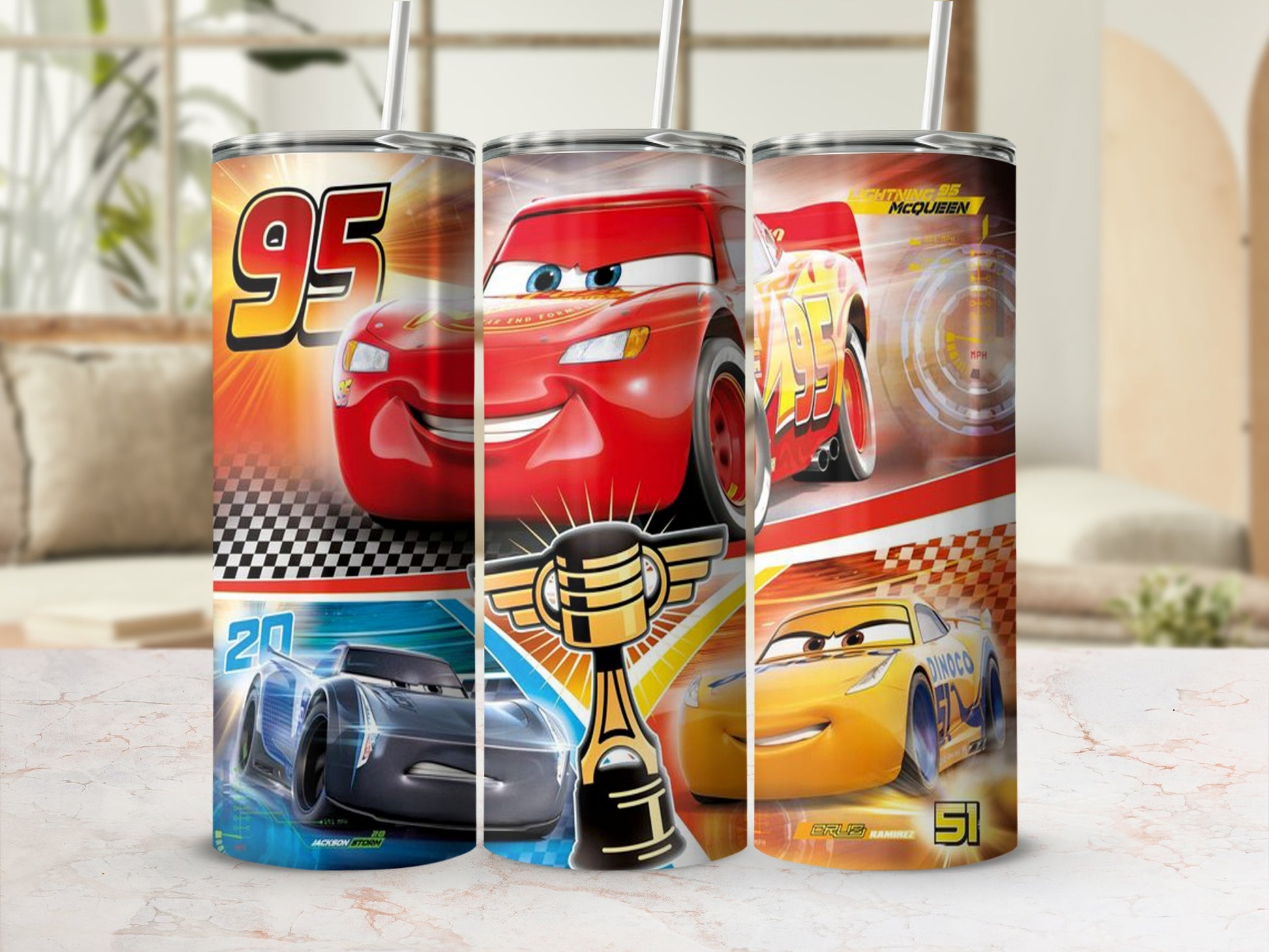 Disney Cars characters Lightning McQueen, Cruz Ramirez, and Jackson Storm on tumblers.