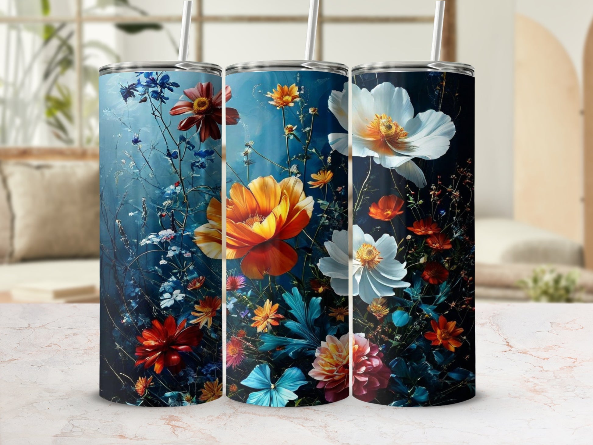 Three tumblers featuring a dark, moody floral design with vibrant blossoms.