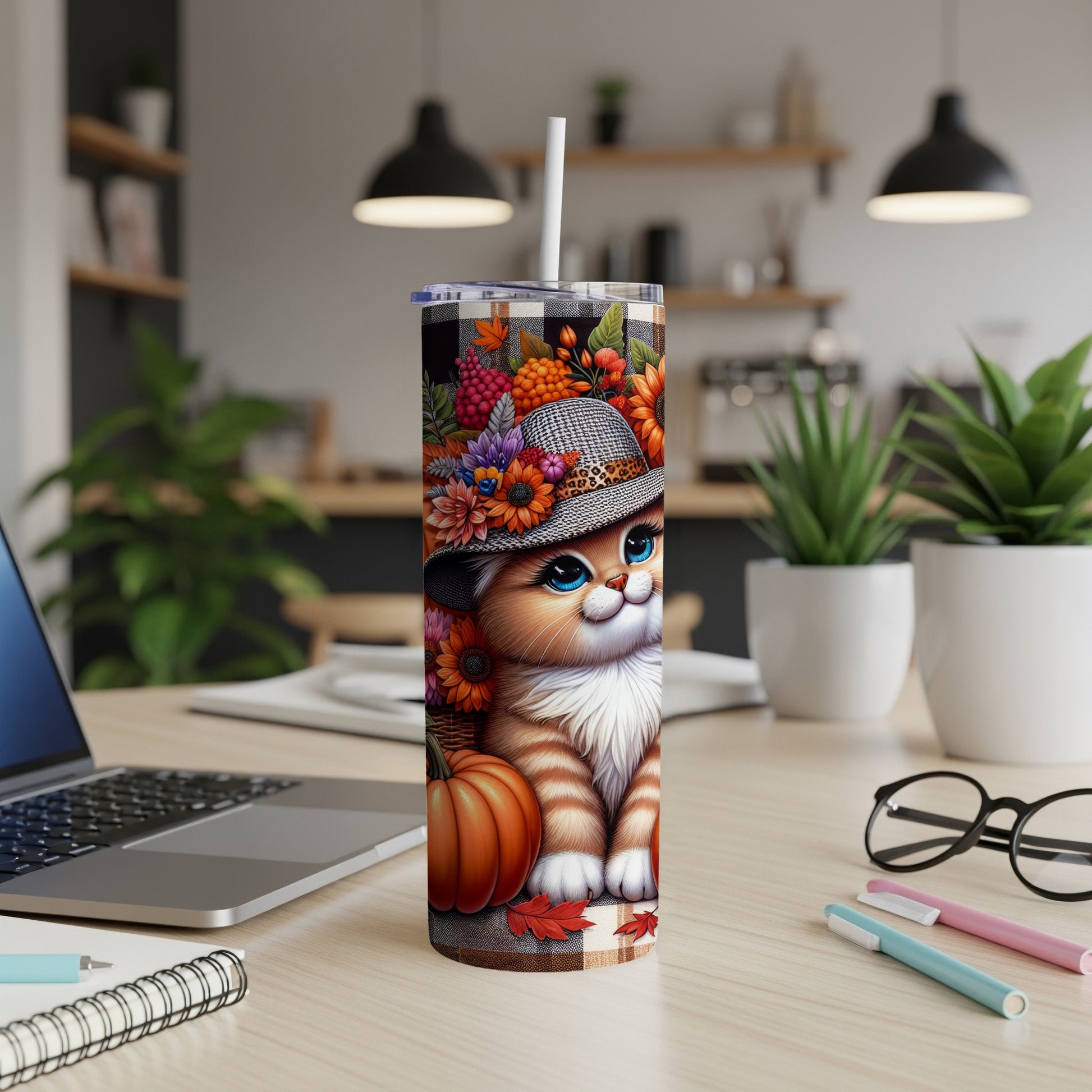 Cute cat with floral hat and pumpkin design on a tumbler.