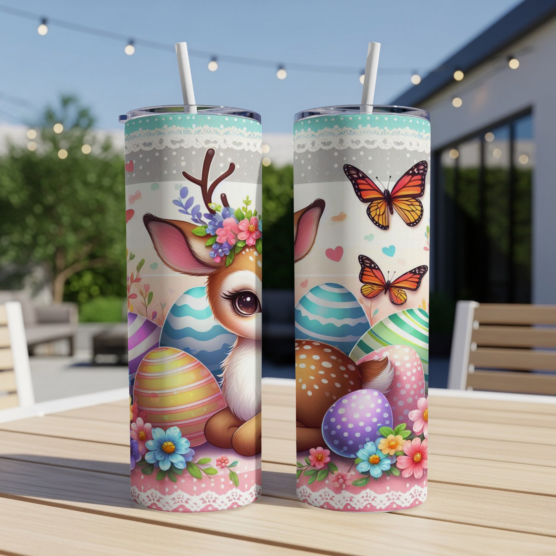 Easter-themed tumbler with a fawn and colorful eggs, decorative butterflies and flowers.