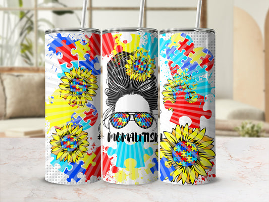 Sunflower autism mom tumbler with colorful puzzle pieces and a messy bun.