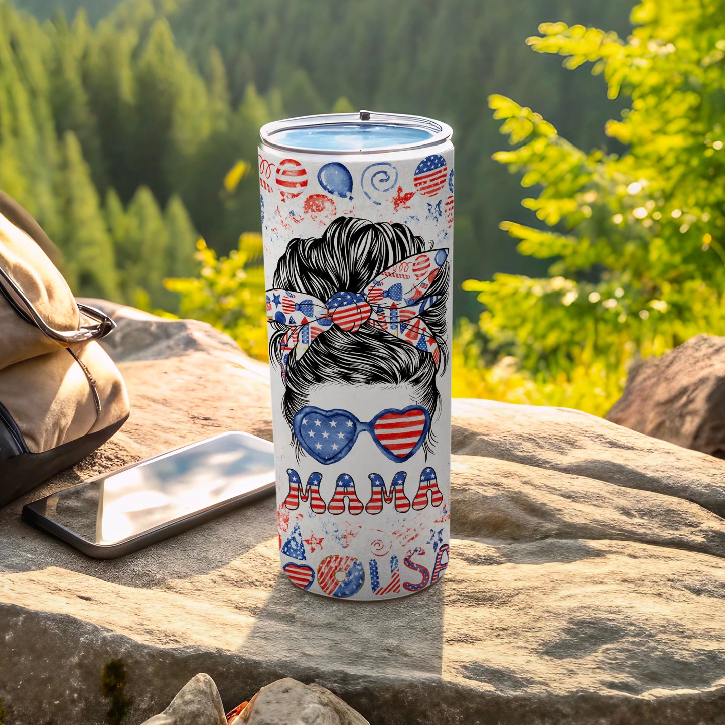 Patriotic Mama USA tumbler with star sunglasses and messy bun graphic.