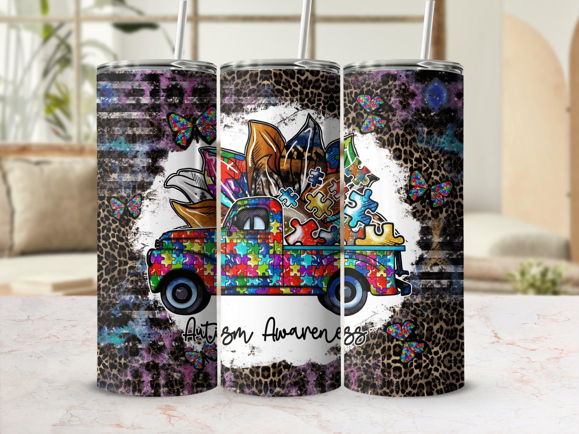 Colorful truck with puzzle pieces and butterflies, "Autism Awareness" text.