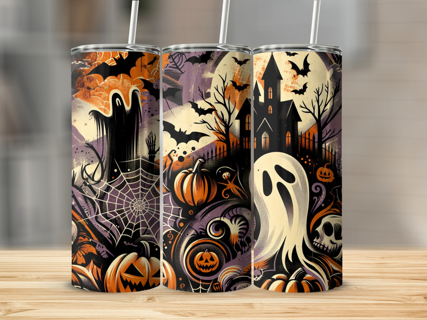 Three Halloween-themed tumblers with ghosts, pumpkins, bats, and a haunted house.