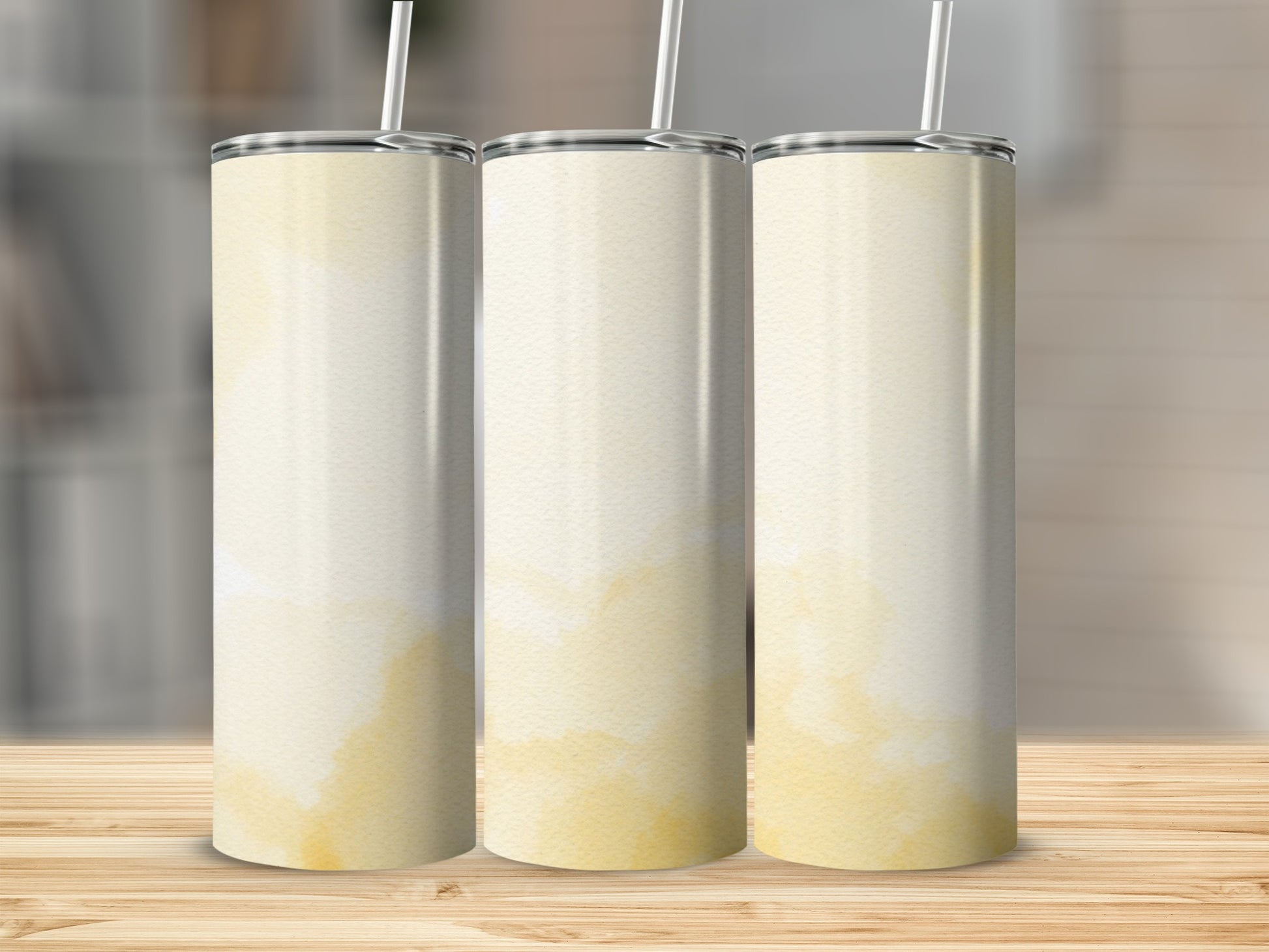 Three tall, plain tumblers with a light watercolor wash effect.