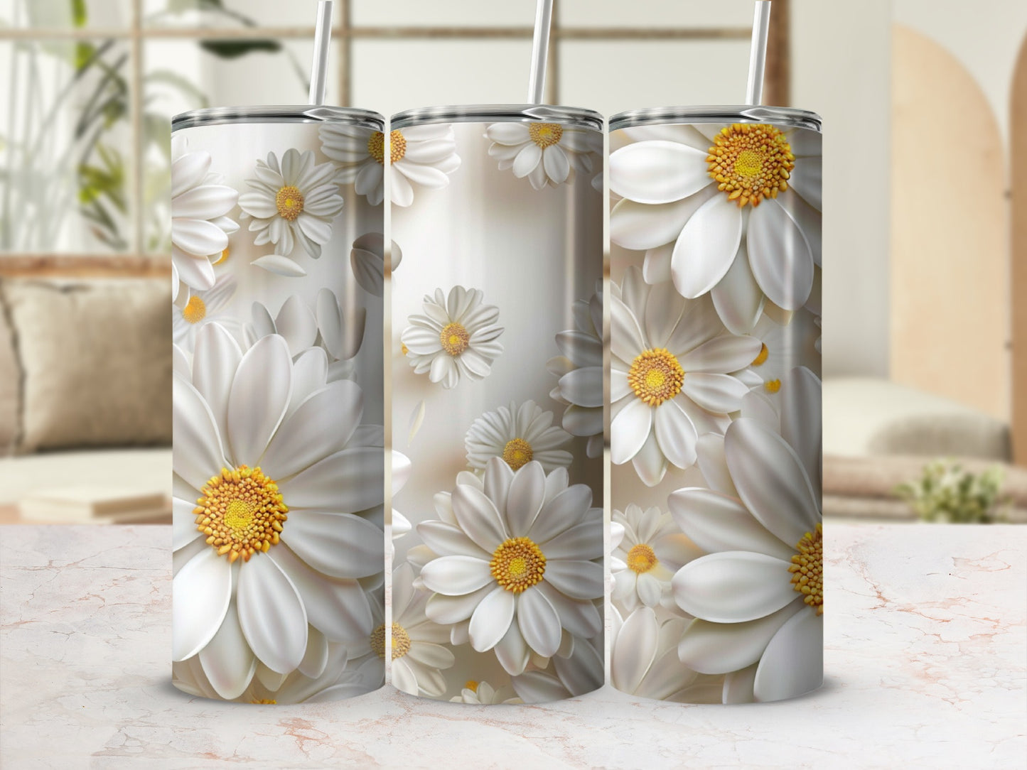Three tumblers with white daisy floral pattern and gold centers.