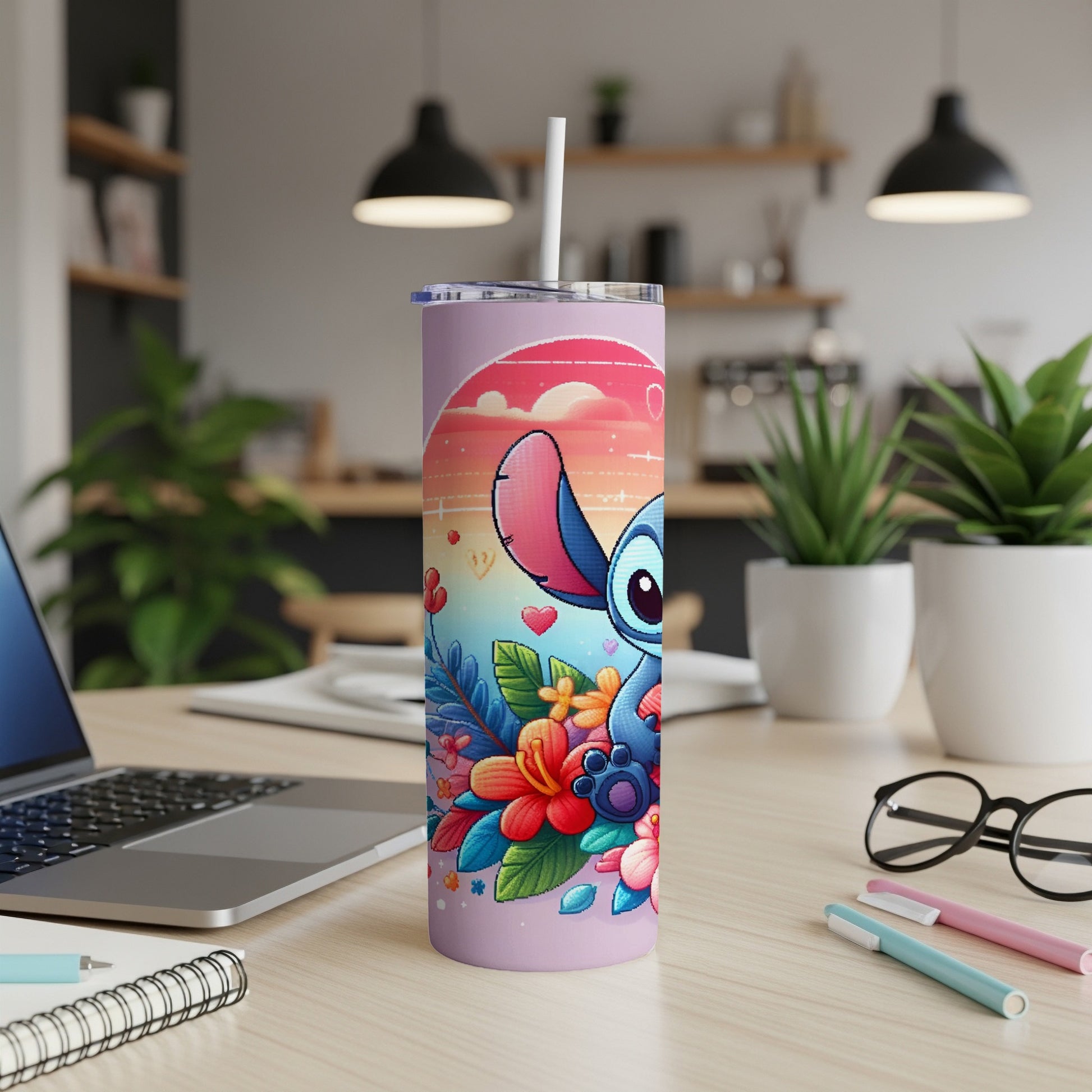 Stitch tumbler with floral design and sunset background.