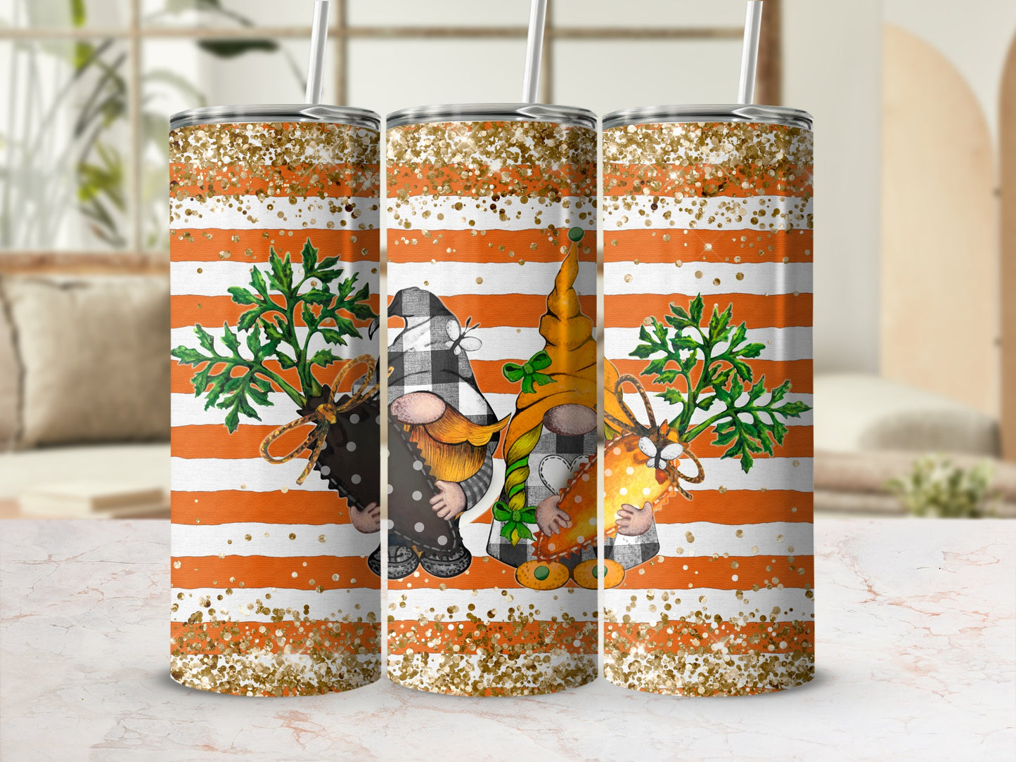 Three tumblers with gnome designs and orange and white stripes.