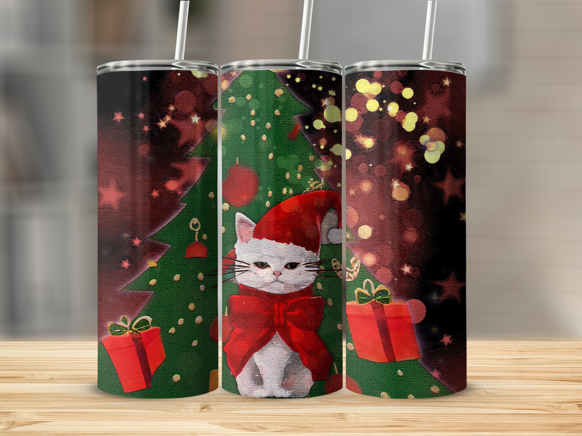 Three tumblers with a Christmas cat wearing a Santa hat and bow tie.